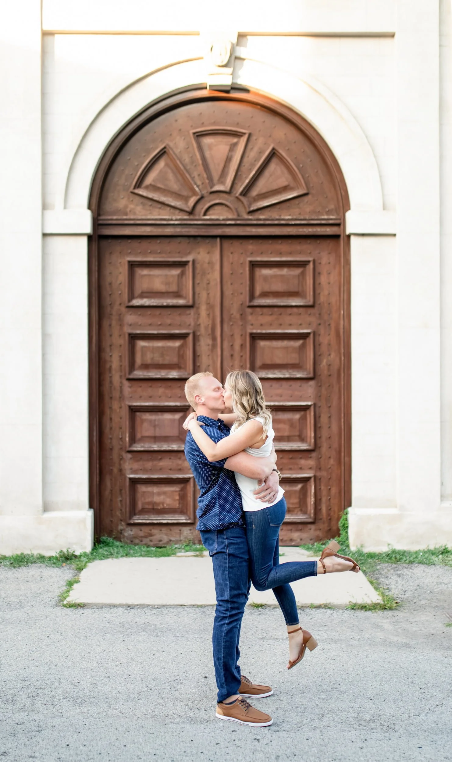 Couple portrait at historic wooden doors of Dundurn Castle