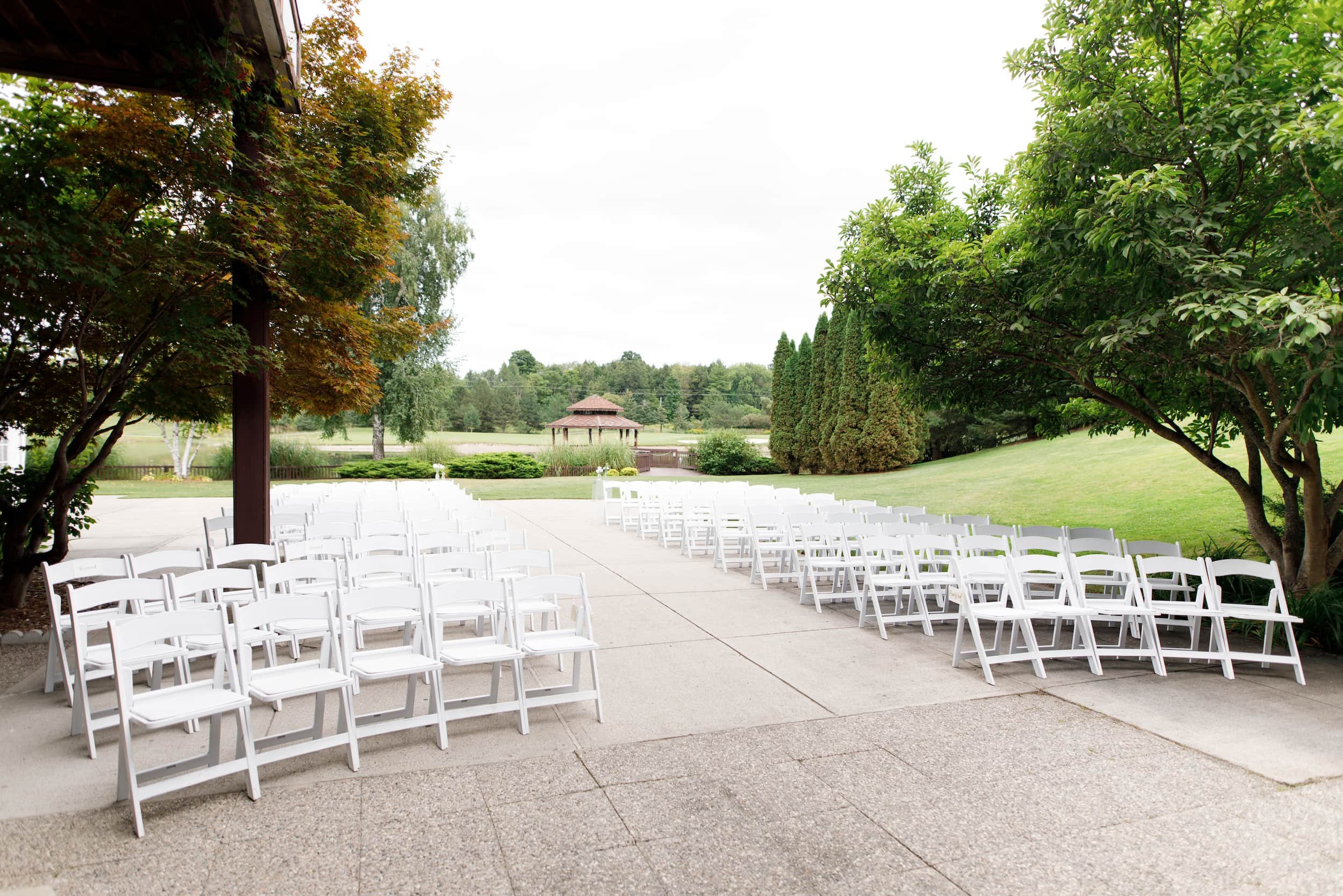 Outdoor ceremony setup overlooking the grounds at The Manor Event Venue in King, Ontario