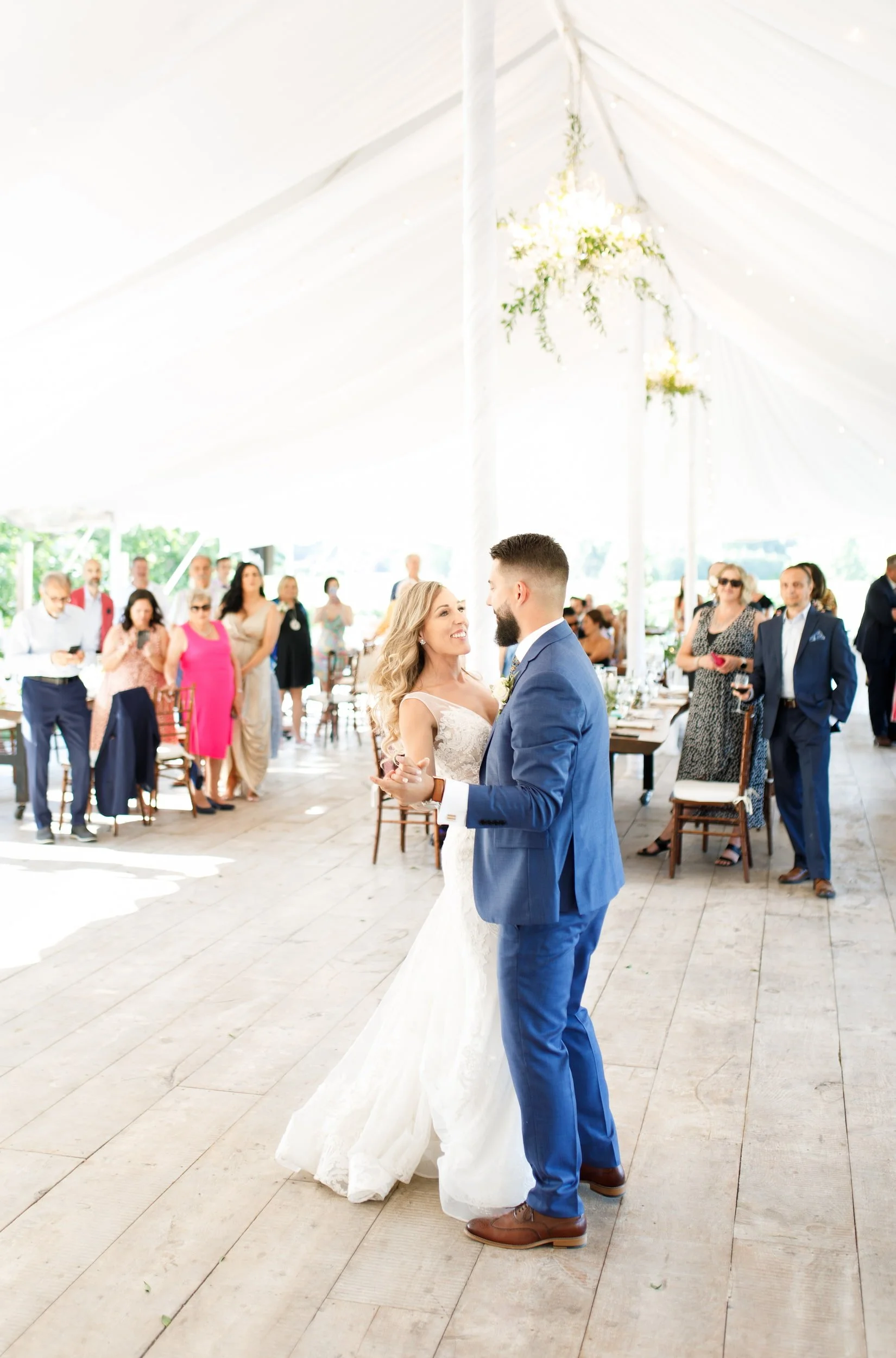 First dance beneath reception tent at Kurtz Orchards wedding