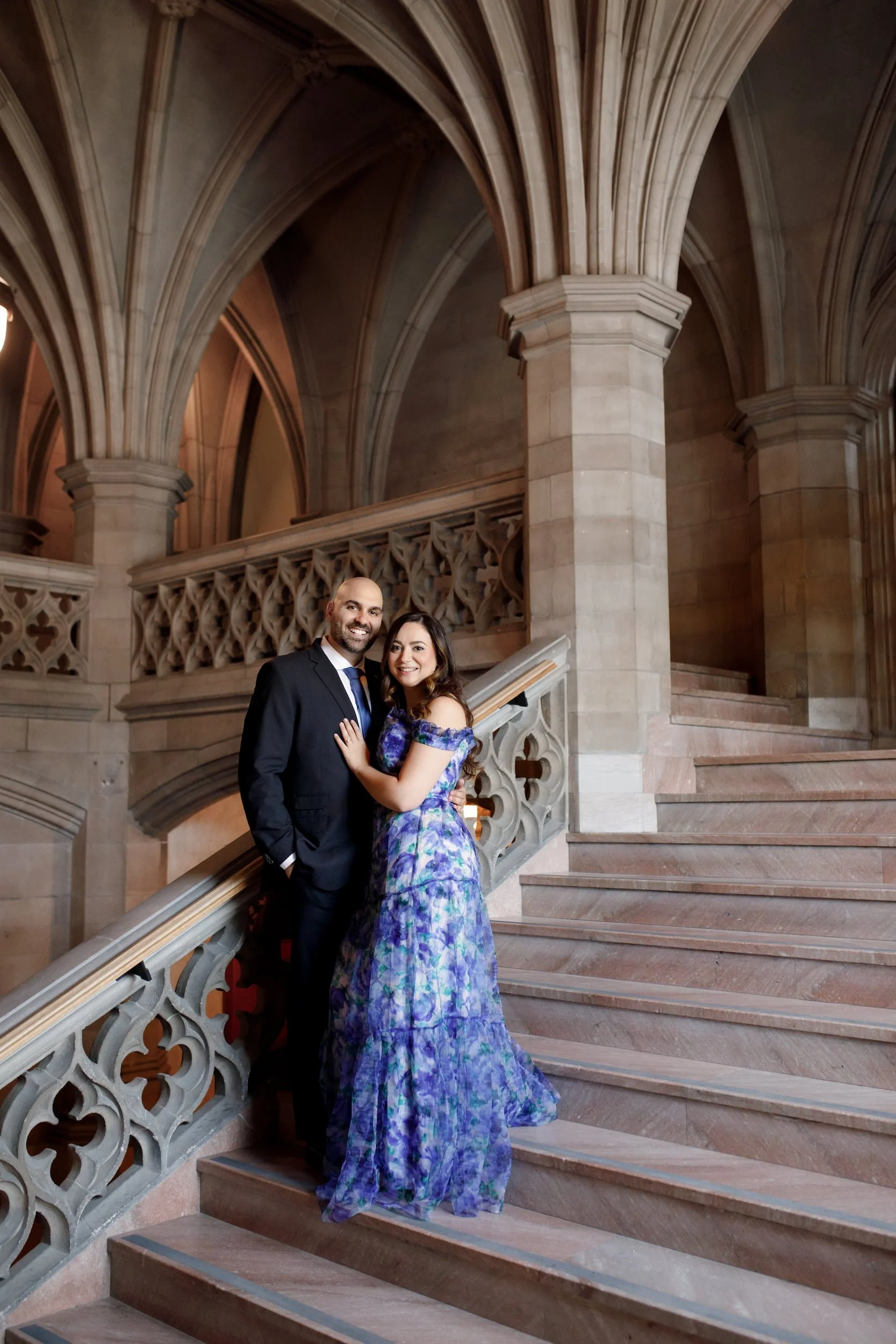 Engagement session on grand staircase at Knox College, University of Toronto in Toronto, Ontario