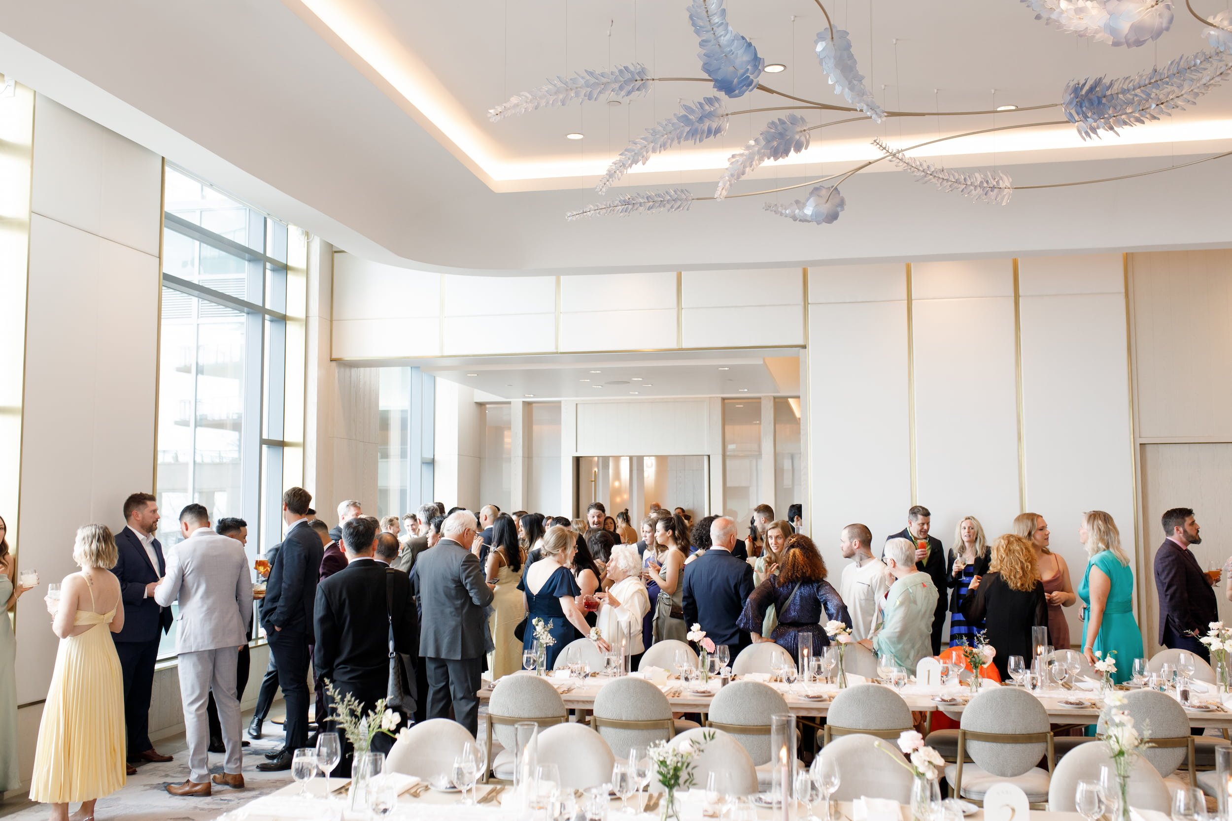 Cocktail hour in bright contemporary ballroom at The Pearle Hotel & Spa in Burlington