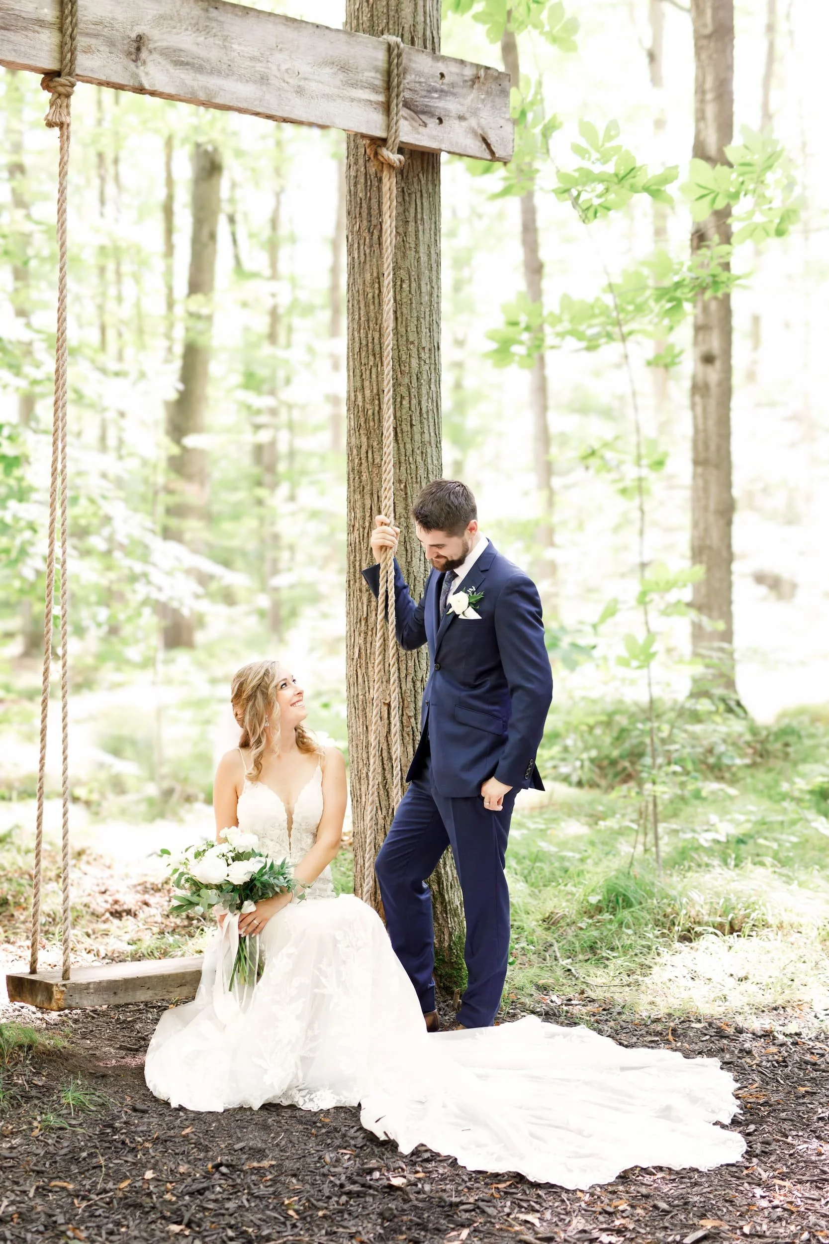 Romantic woodland forest swing portrait in the woods at Whistle Bear Golf Club in Cambridge, Ontario