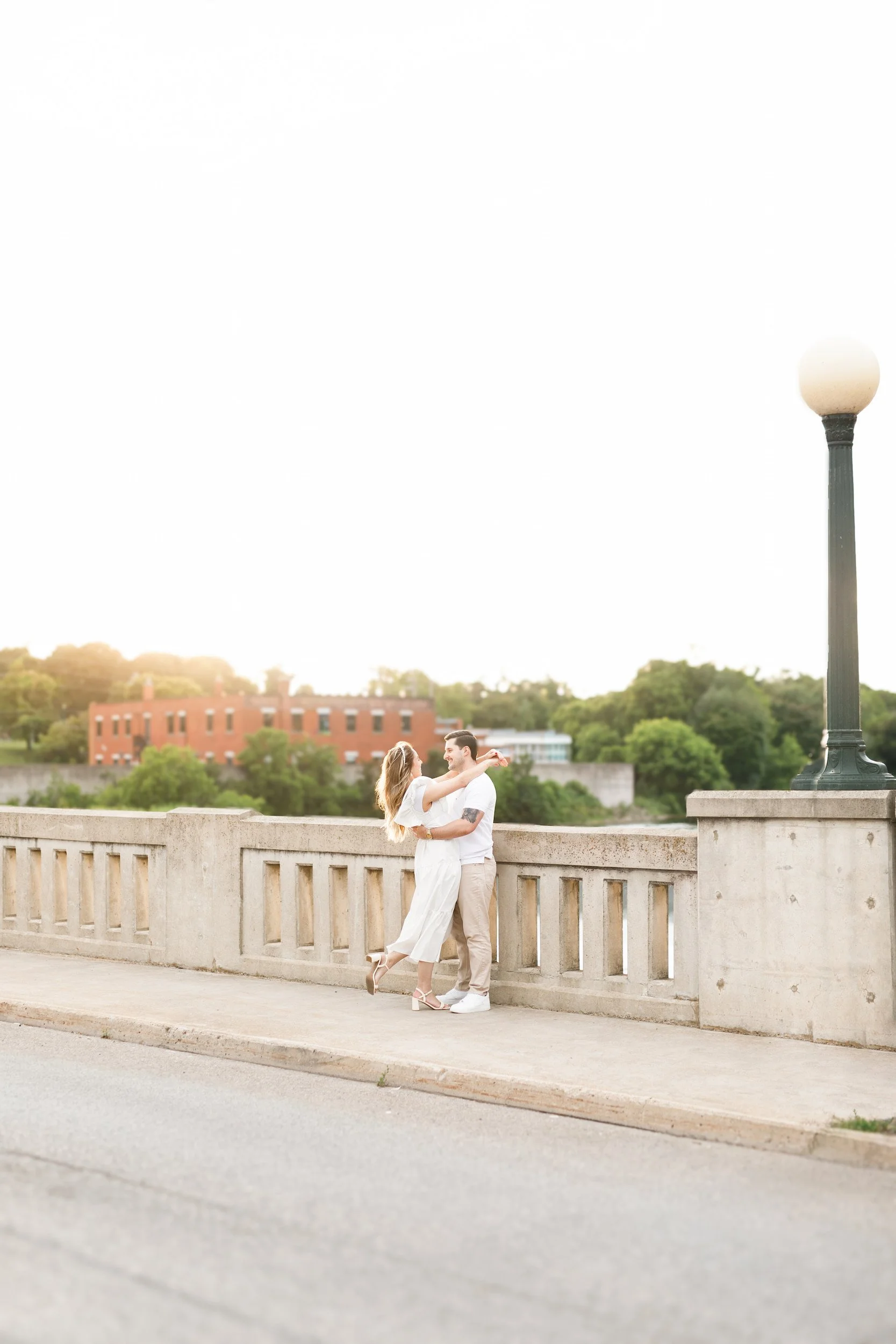 Sunset engagement session at Mill Race Park along the Grand River in Cambridge