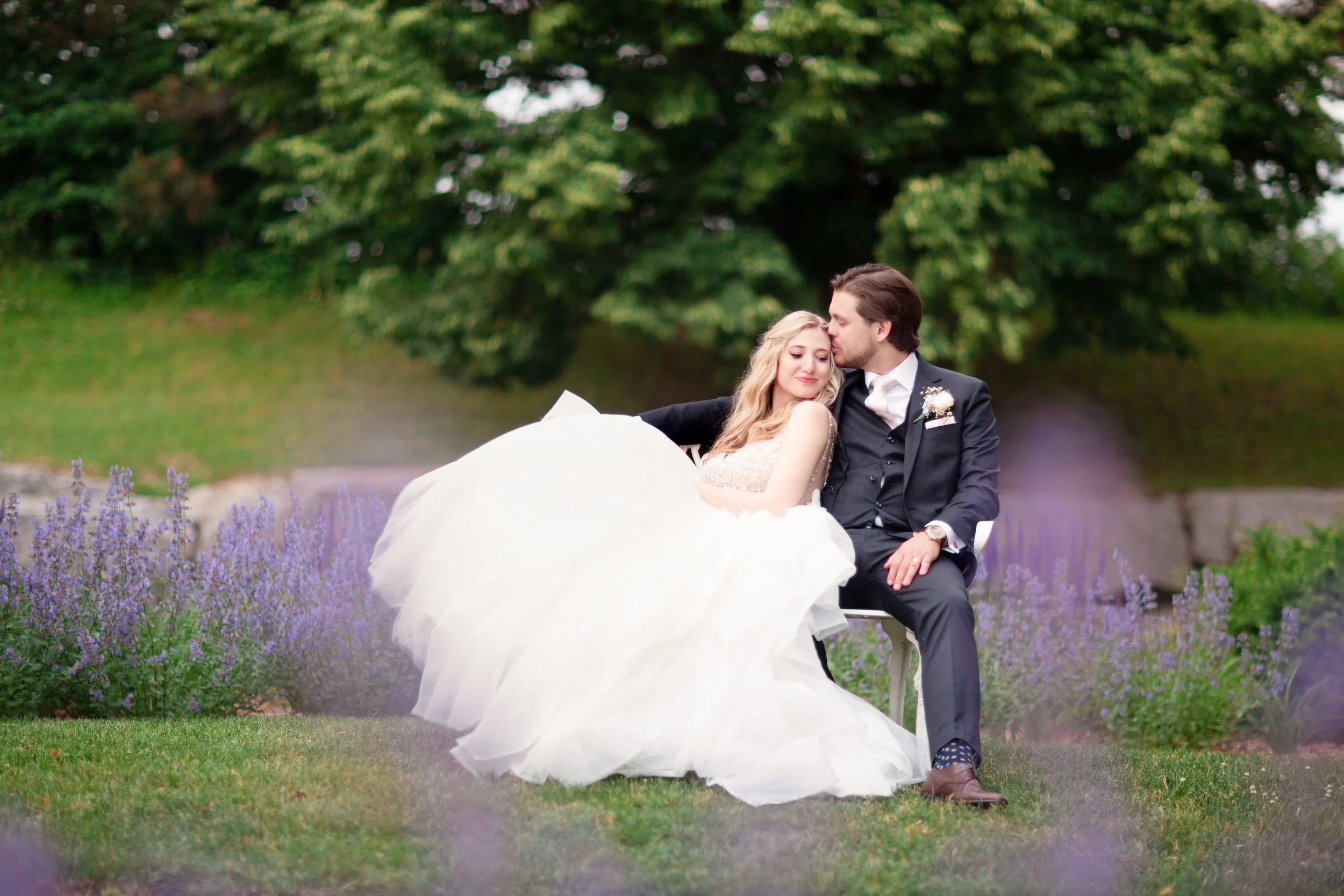 Romantic portrait with flowing gown in garden setting at The Manor Event Venue in King, Ontario