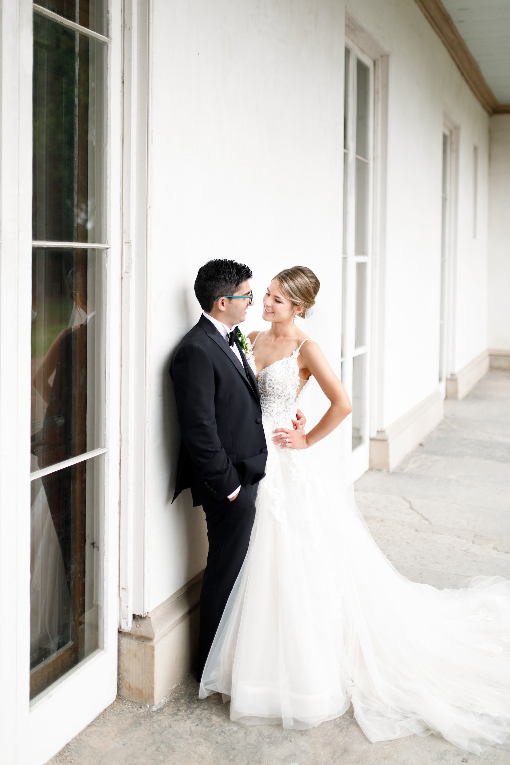 Romantic wedding portrait along Dundurn Castle colonnade
