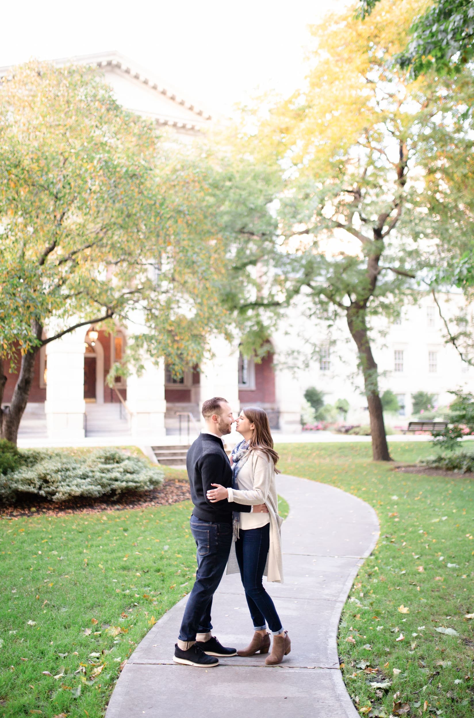 Autumn engagement photos in garden courtyard at Osgoode Hall