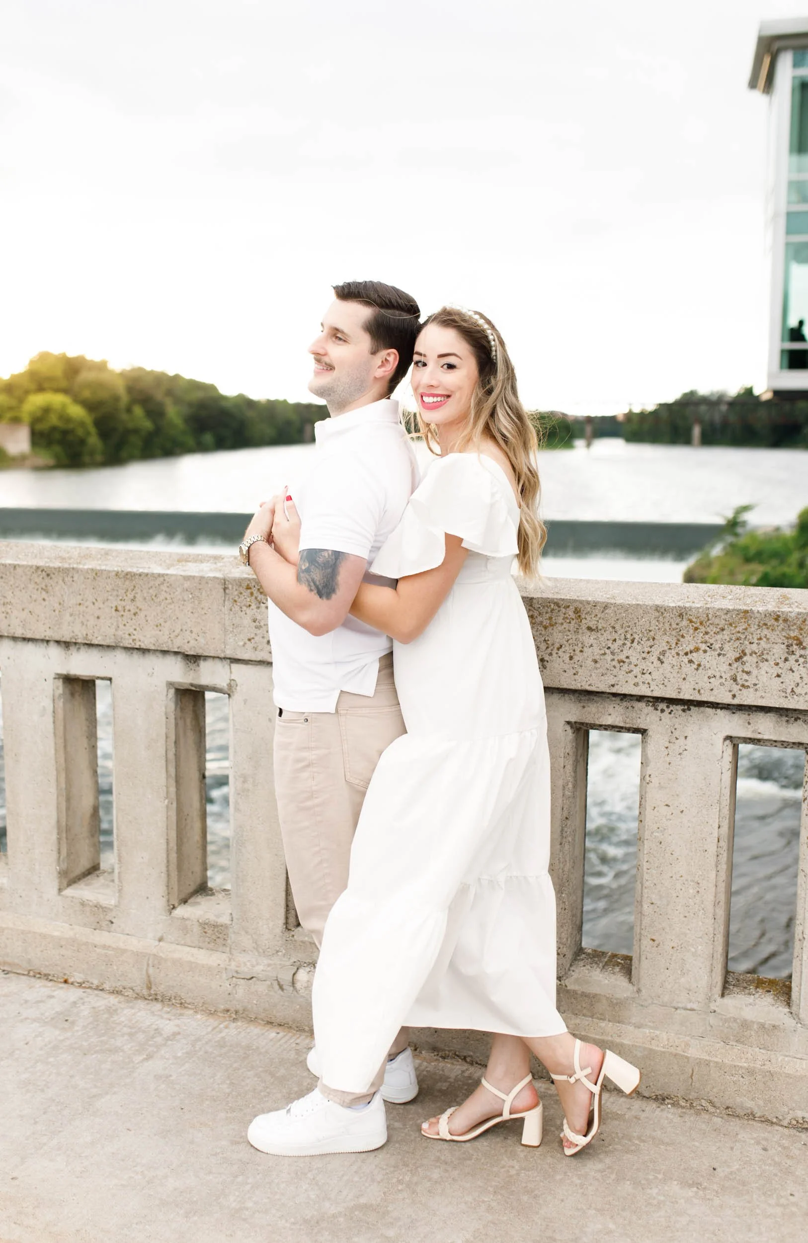 Couple portrait overlooking the Grand River at Mill Race Park in Cambridge, Ontario