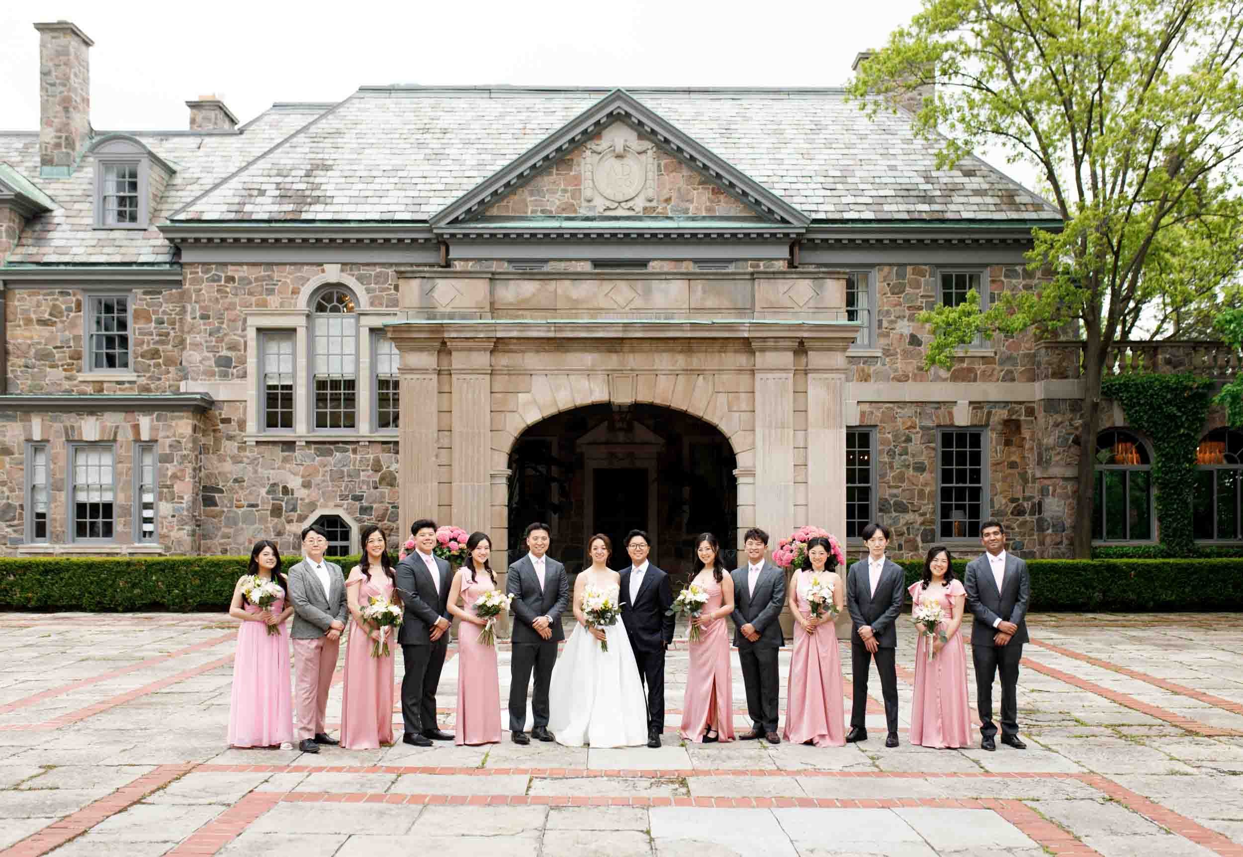 Wedding party portrait in Graydon Hall Manor courtyard