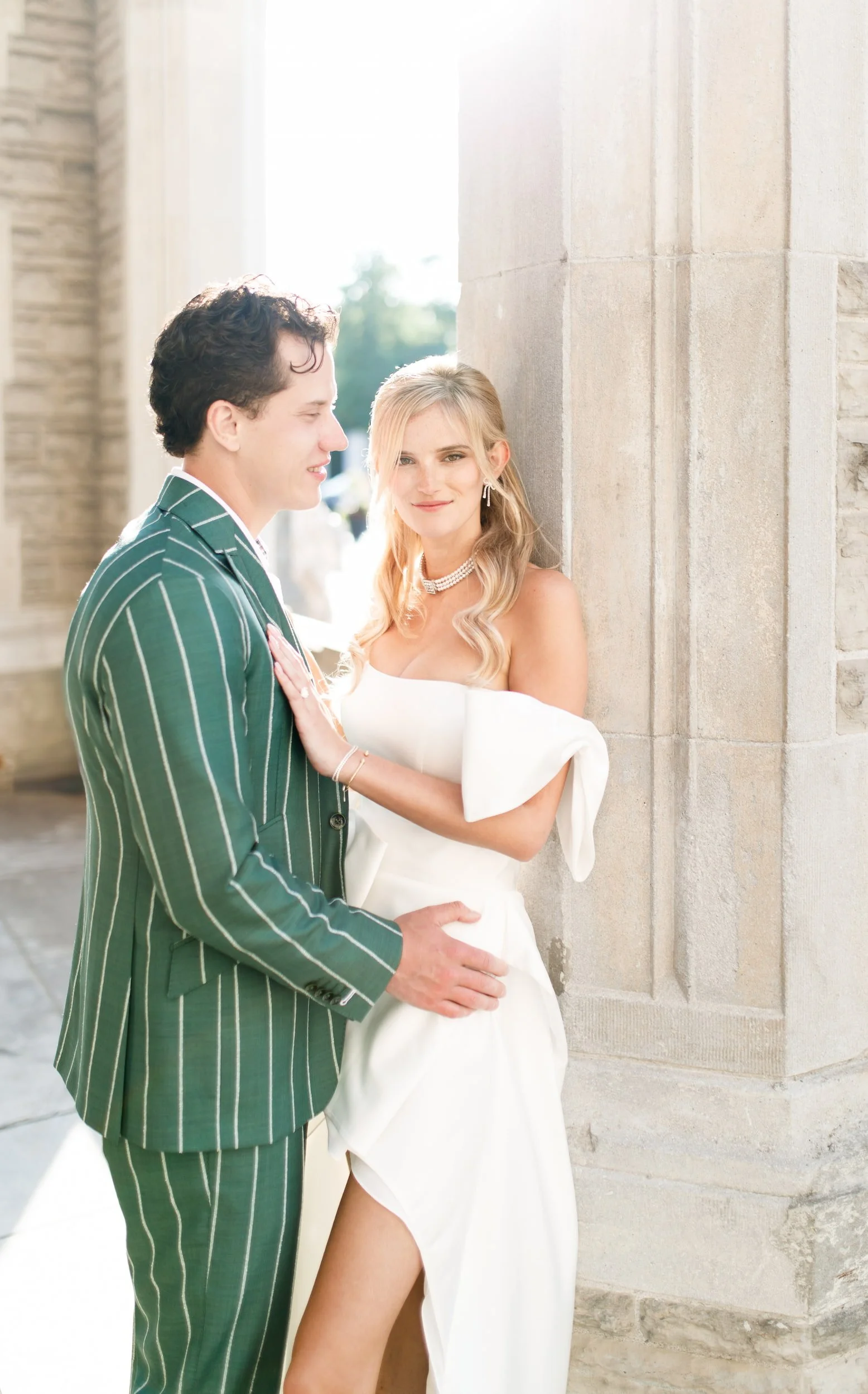 Elegant sun-drenched engagement portrait at Casa Loma in Toronto