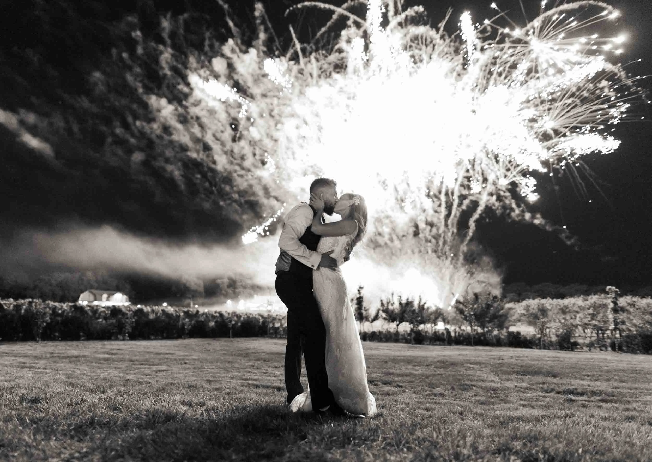 Black and white fireworks exit at Kurtz Orchards wedding in Niagara wine country