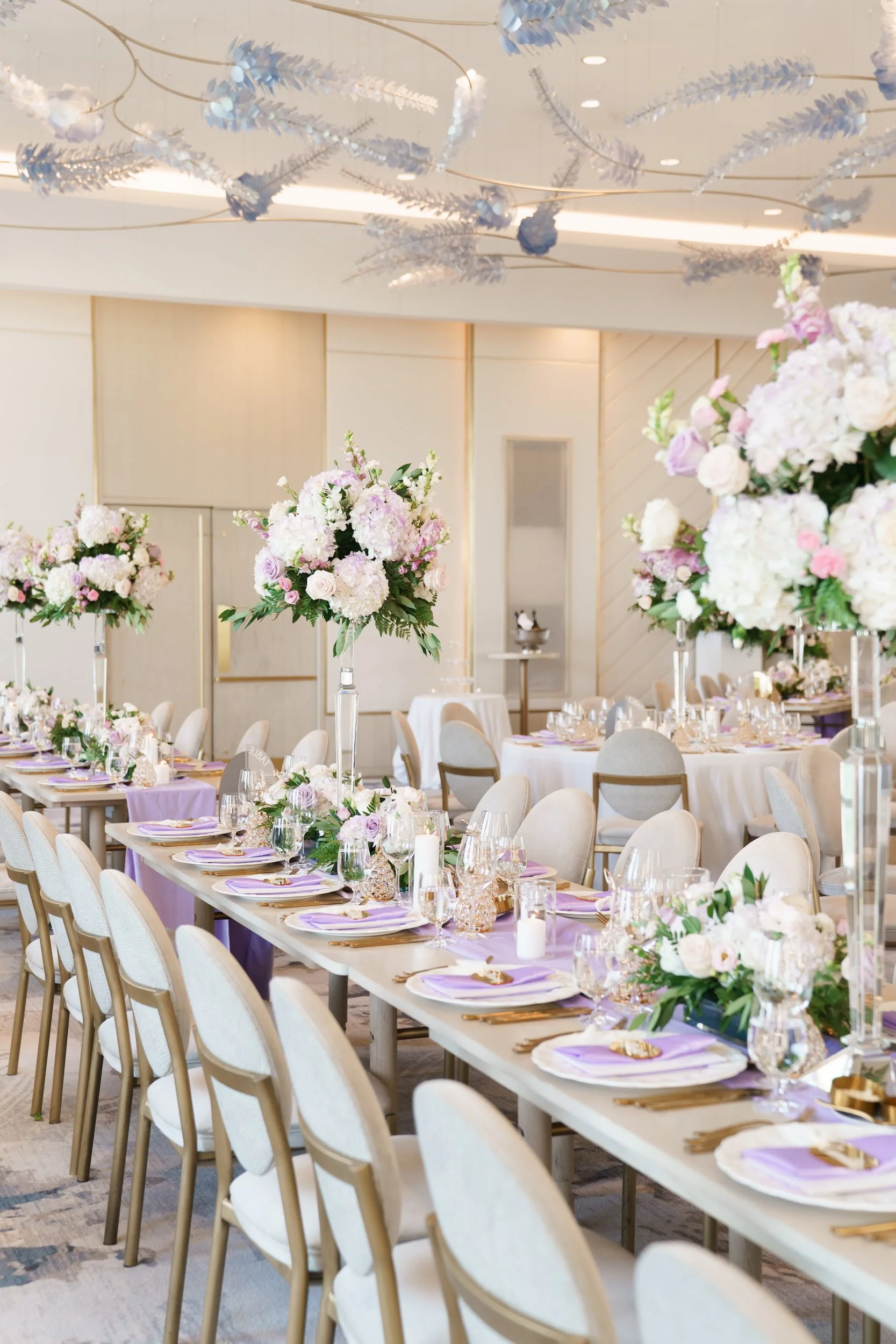 Long head table design in modern reception space at The Pearle Hotel in Burlington, Ontario