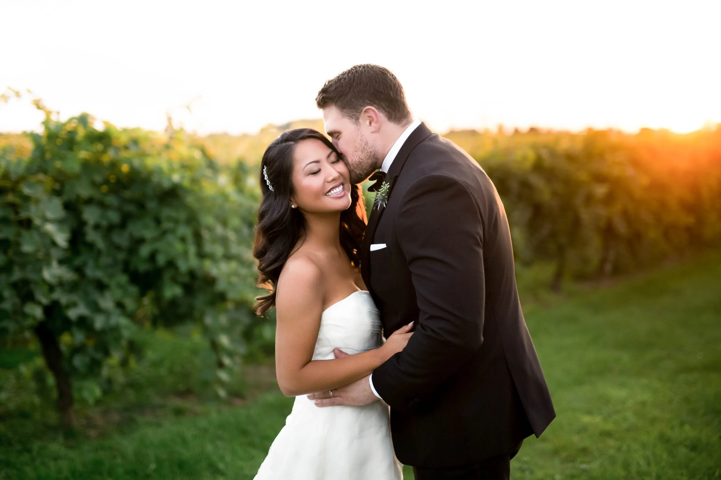 Golden hour embrace in the vineyards at Kurtz Orchards