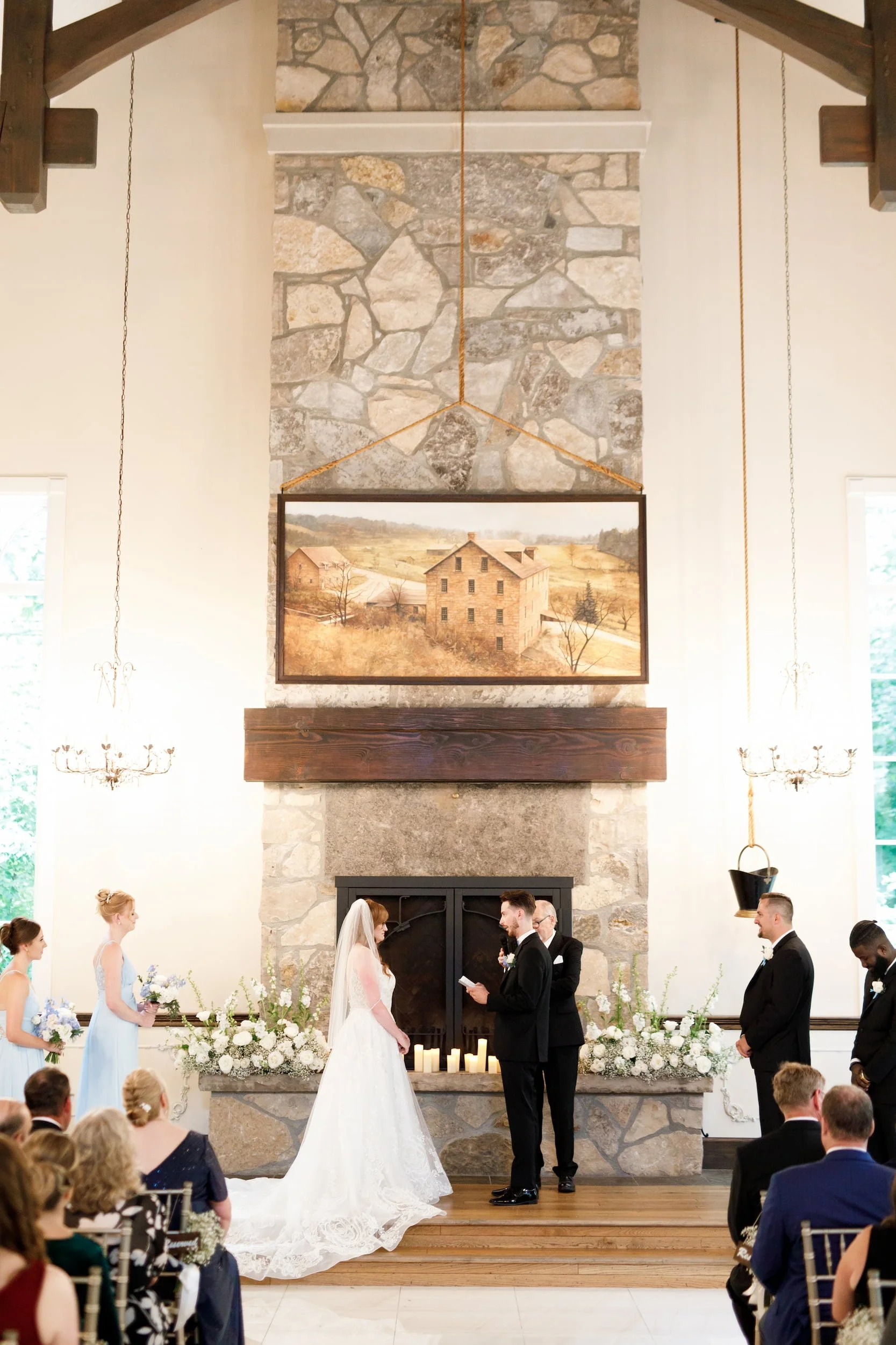 Wedding ceremony at the fireplace inside Miller’s Chapel at the Ancaster Mill