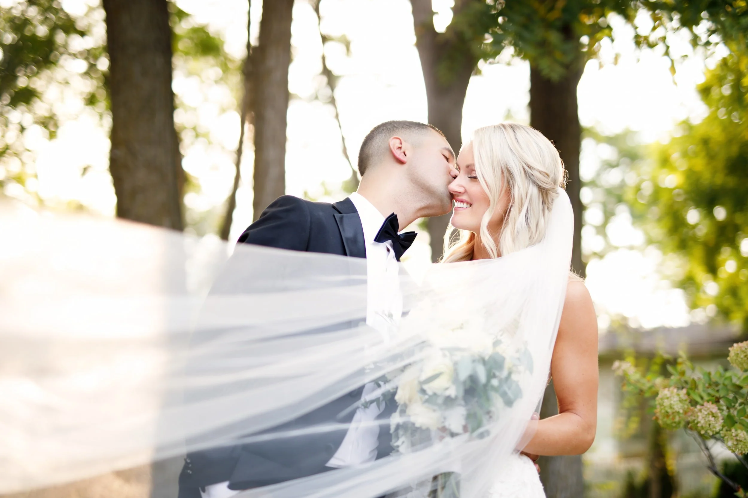 Romantic blowing veil portrait in the garden at The Doctor’s House wedding in Kleinburg, Ontario