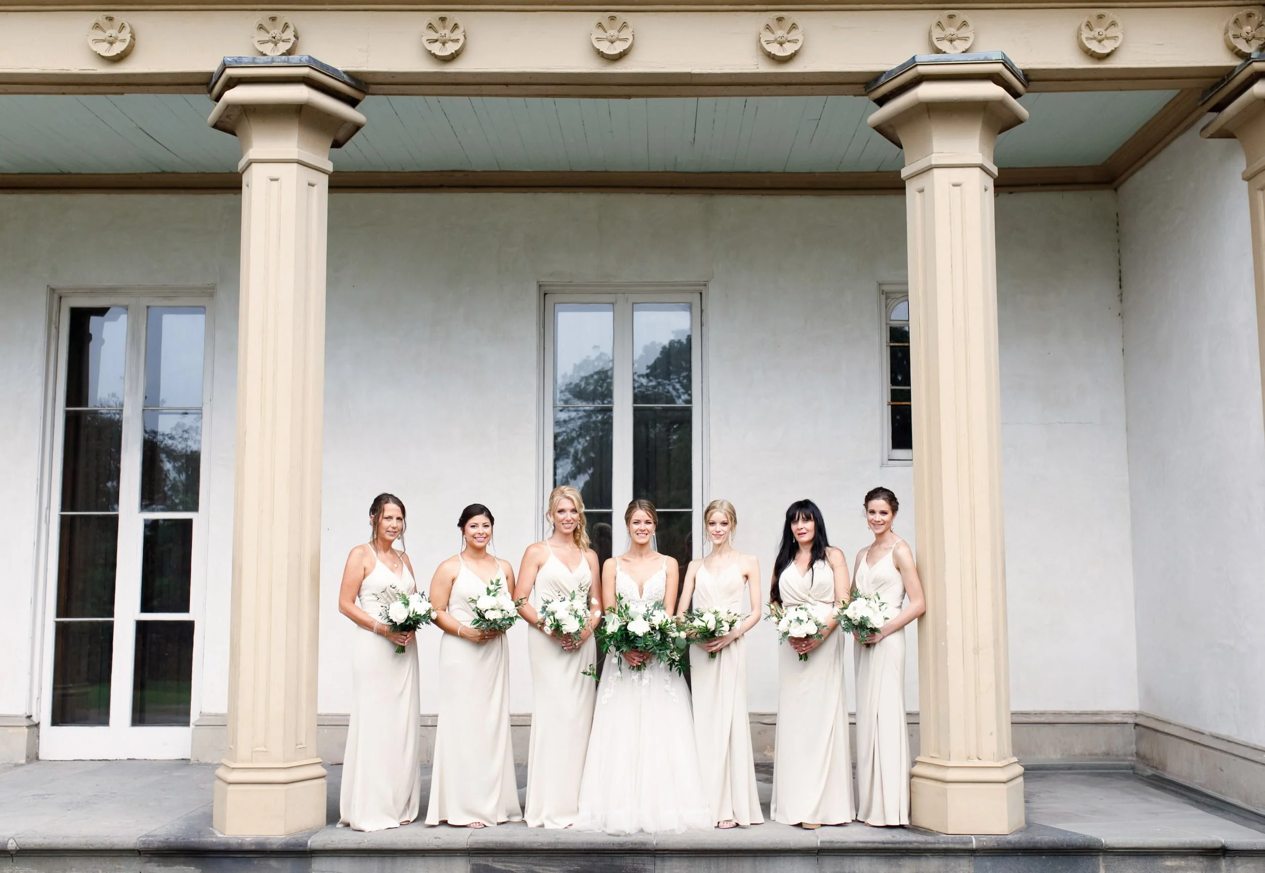 Bridesmaids portrait beneath Dundurn Castle columns