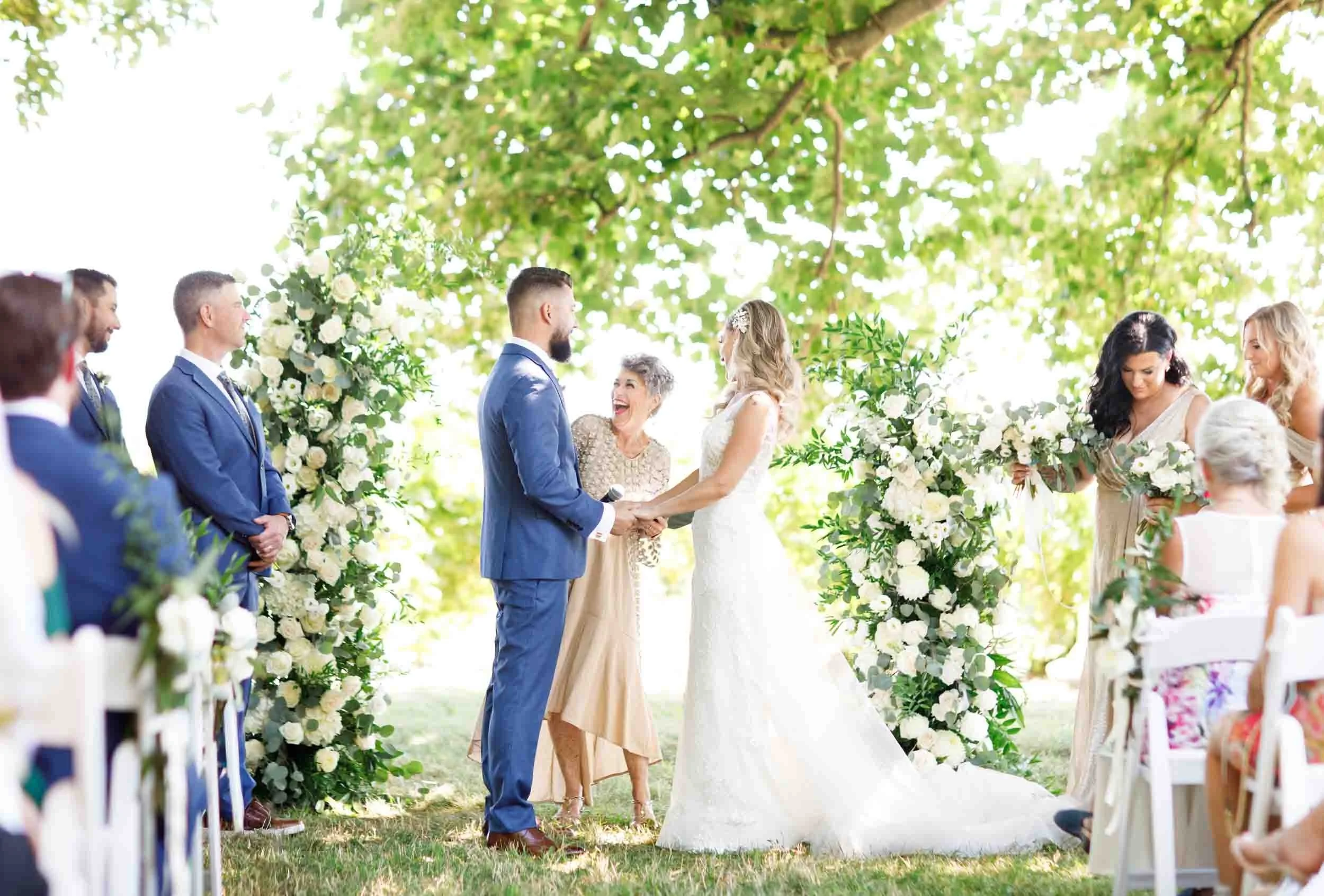 Outdoor wedding ceremony beneath trees at Gracewood Estate in Niagara-on-the-Lake