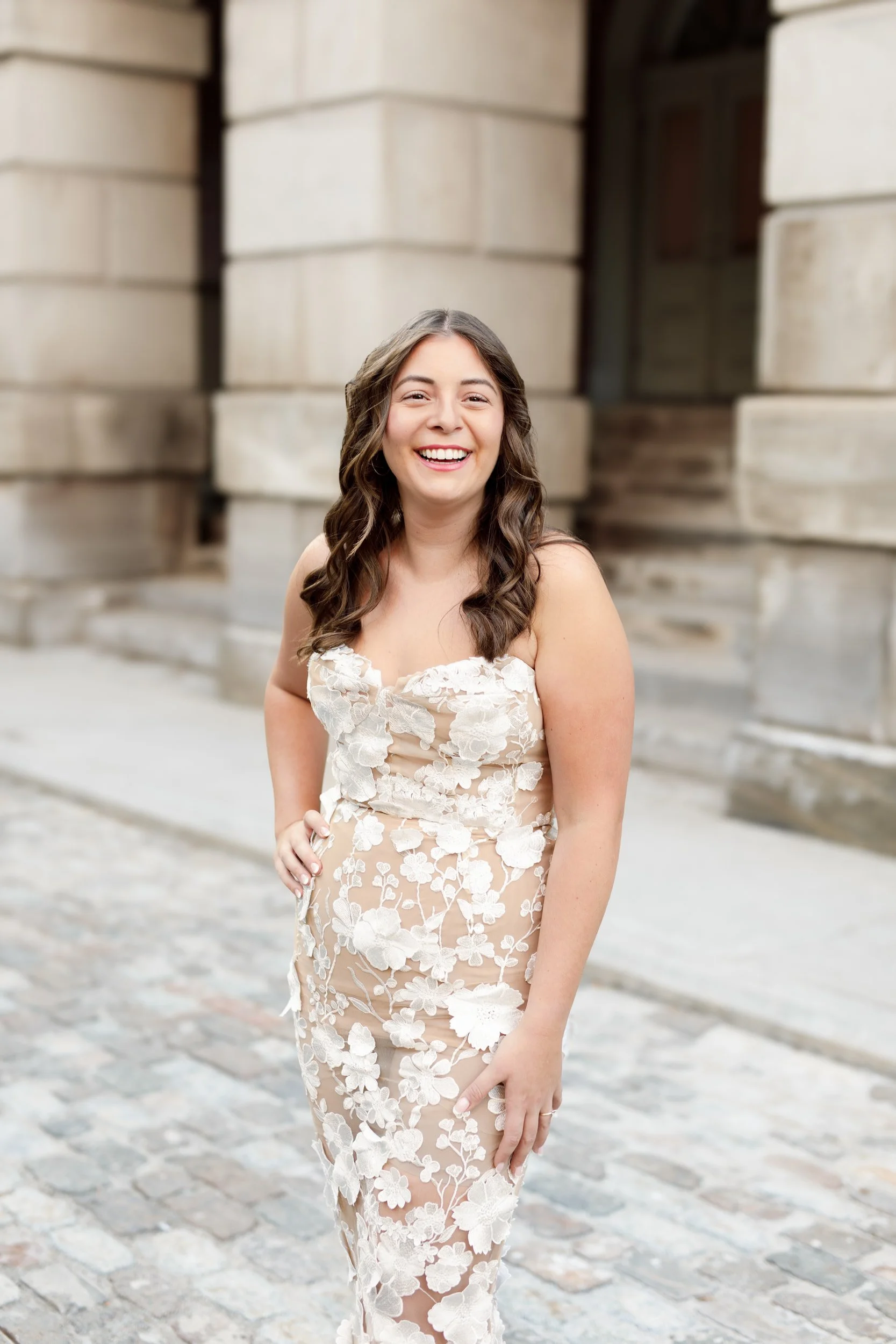 Bridal portrait in cobblestone courtyard at Osgoode Hall in Toronto, Ontario