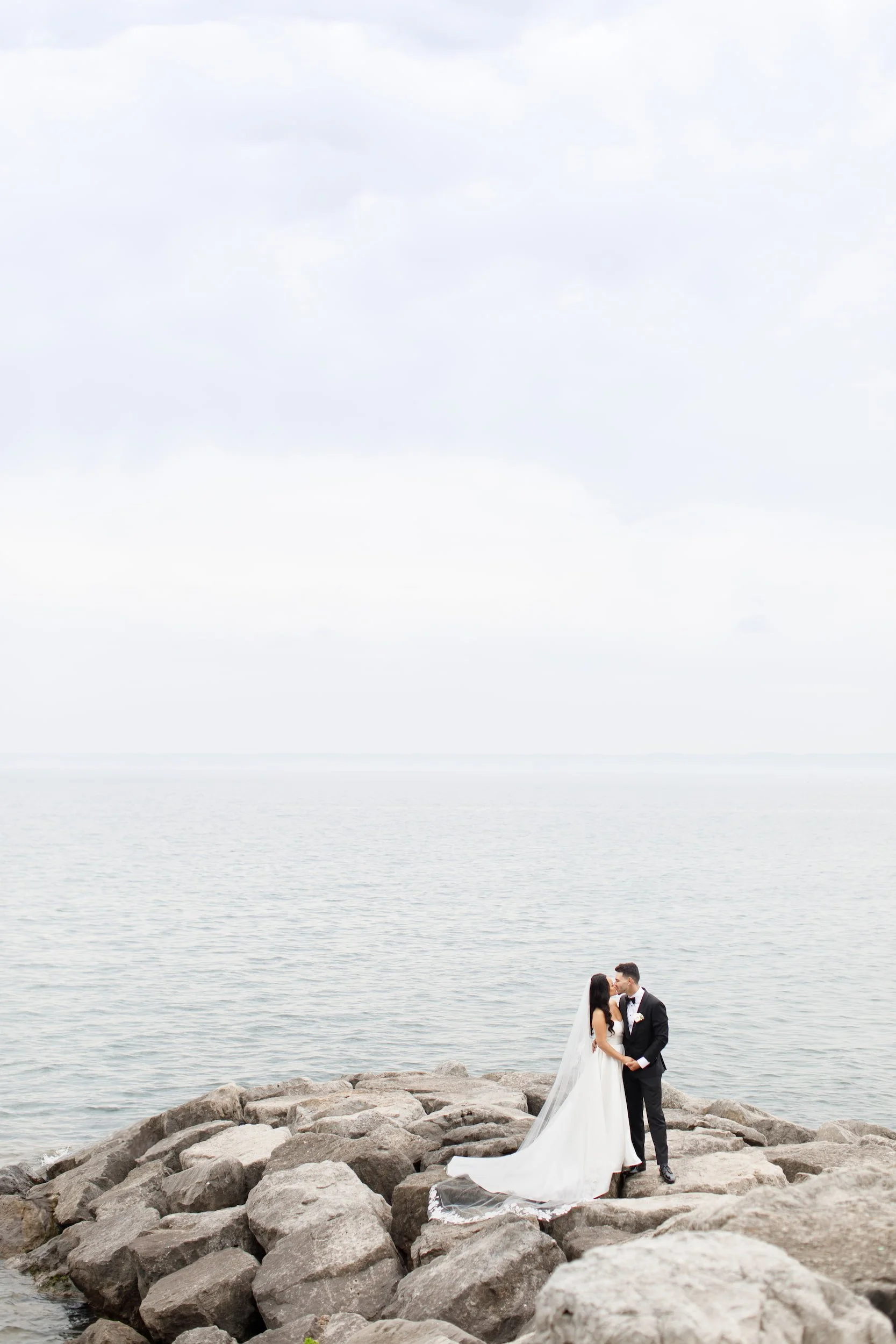 Romantic waterfront portrait at The Pearle Hotel wedding in Burlington, Ontario