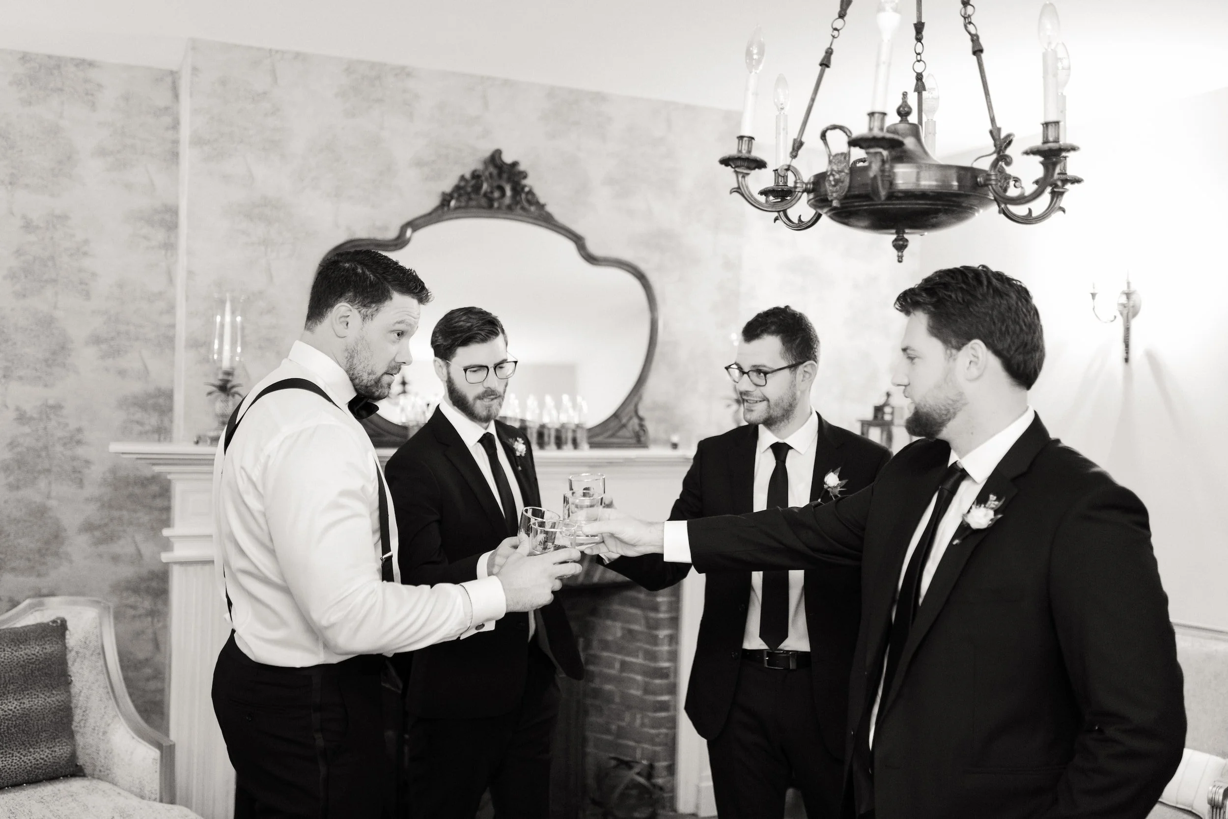 Black and white groom preparation with groomsmen at Gracewood Estate