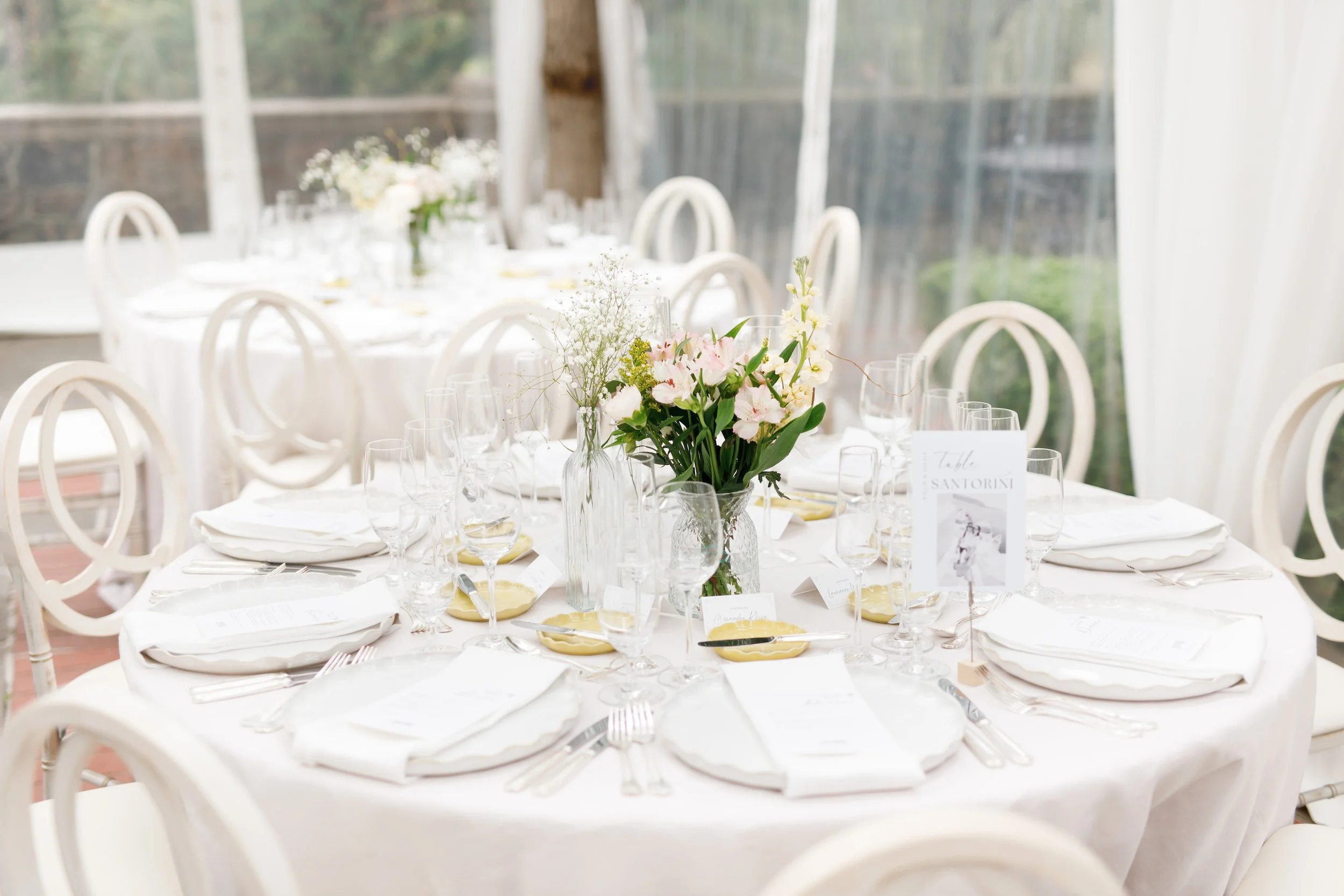 Elegant reception table detail inside tent at Graydon Hall Manor