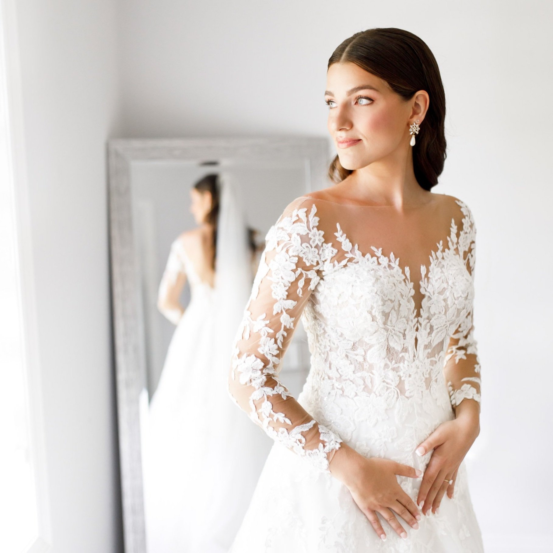 Bride’s portrait in a long-sleeve dress before her Stoney Creek, Ontario wedding ceremony