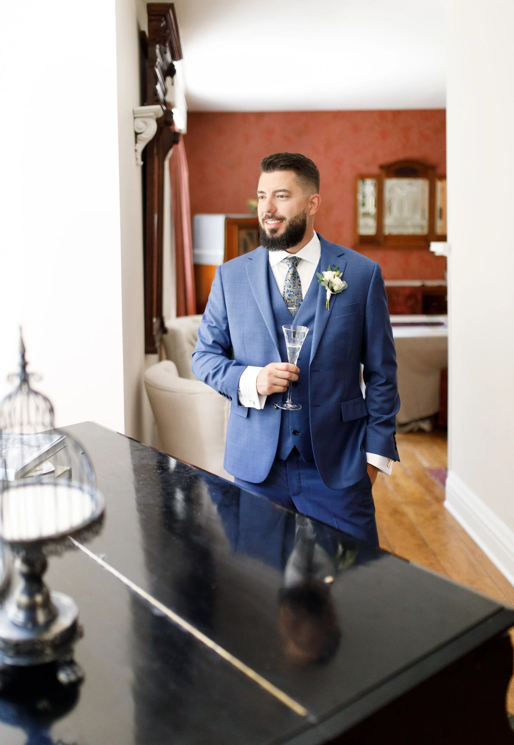 Groom portrait inside Gracewood Estate farmhouse in Niagara-on-the-Lake