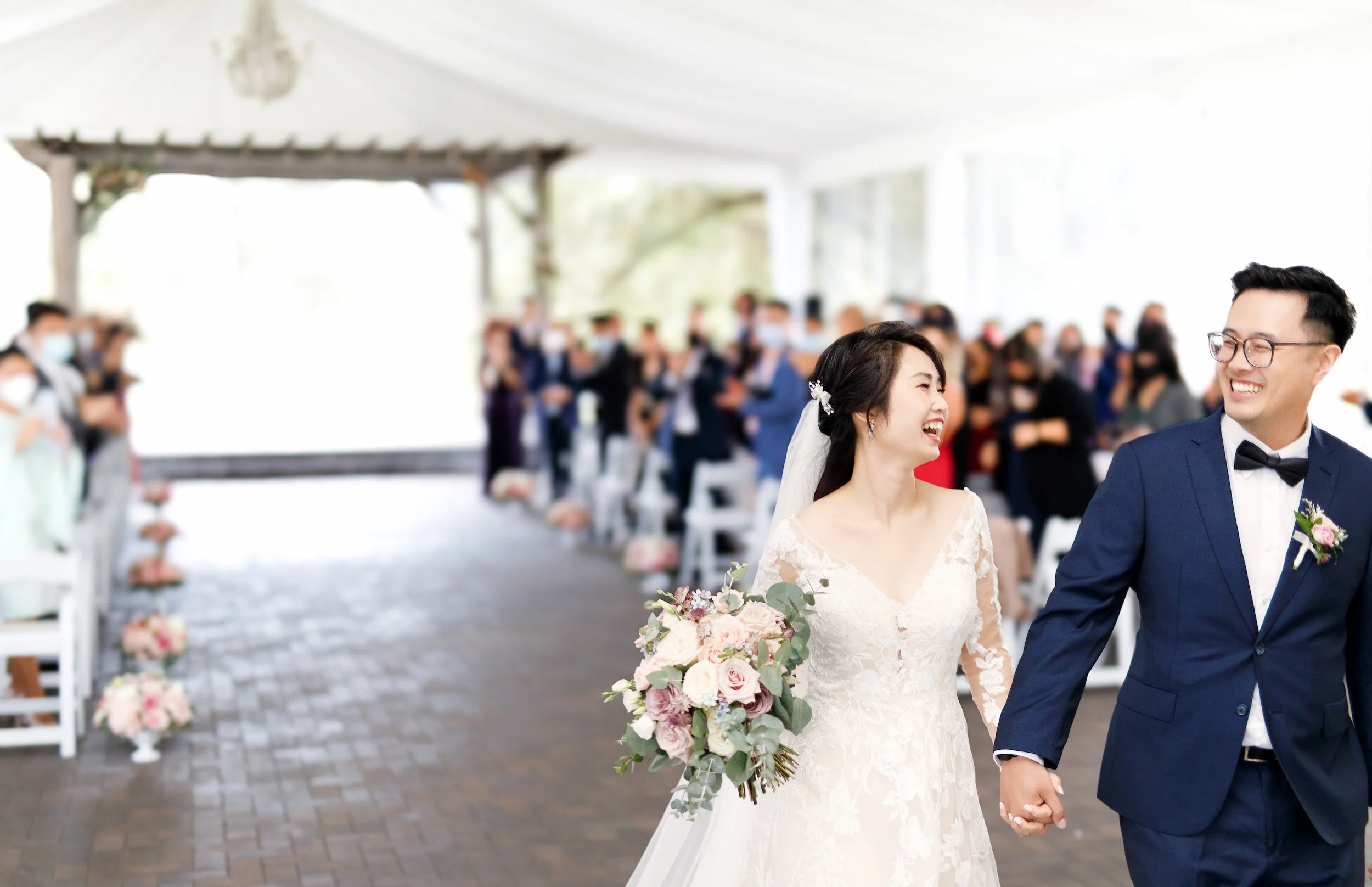 Bride and groom exiting their Arlington Estate wedding ceremony in Vaughan