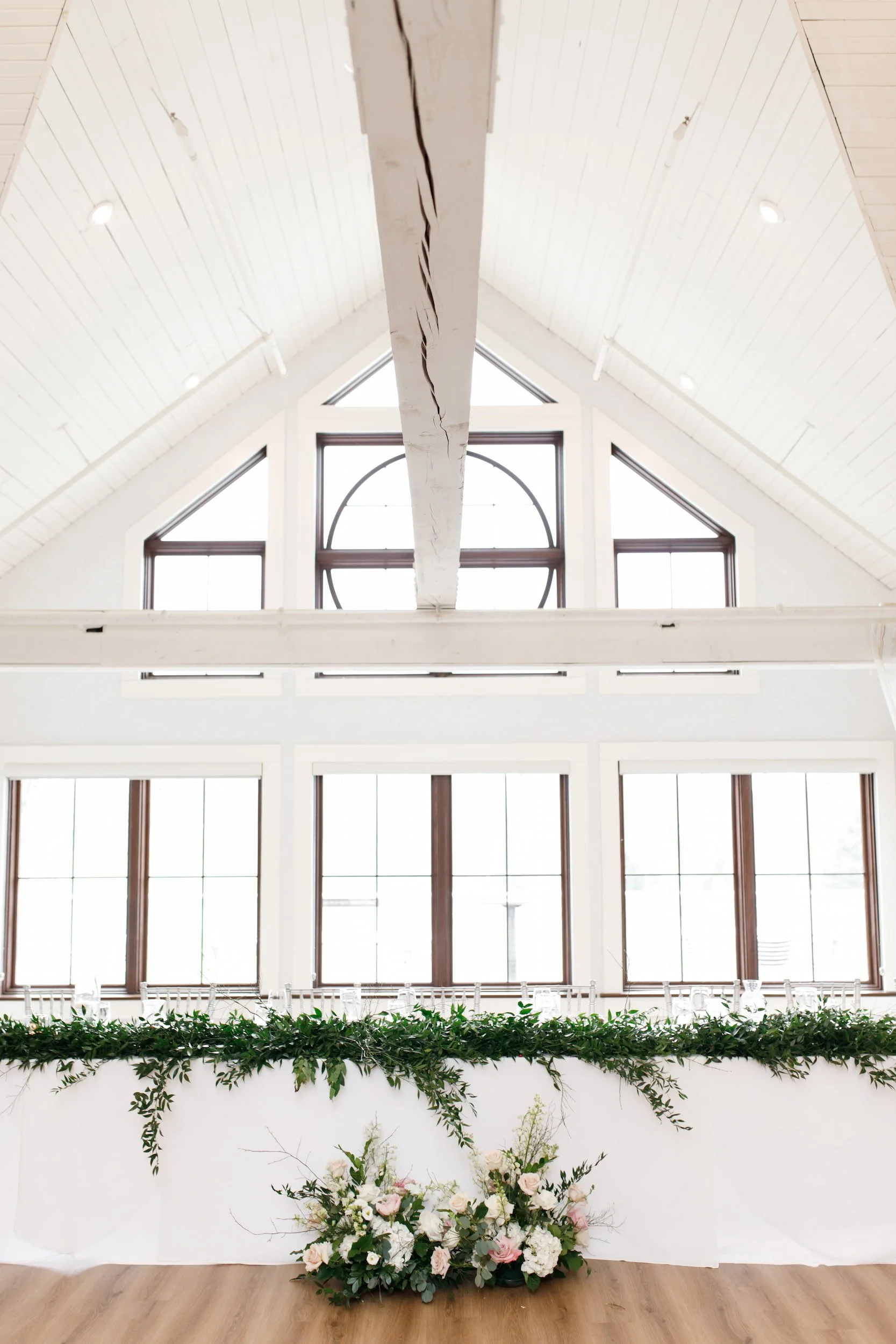 Bright white ceremony pavilion interior at Whistle Bear Golf Club in Cambridge, Ontario