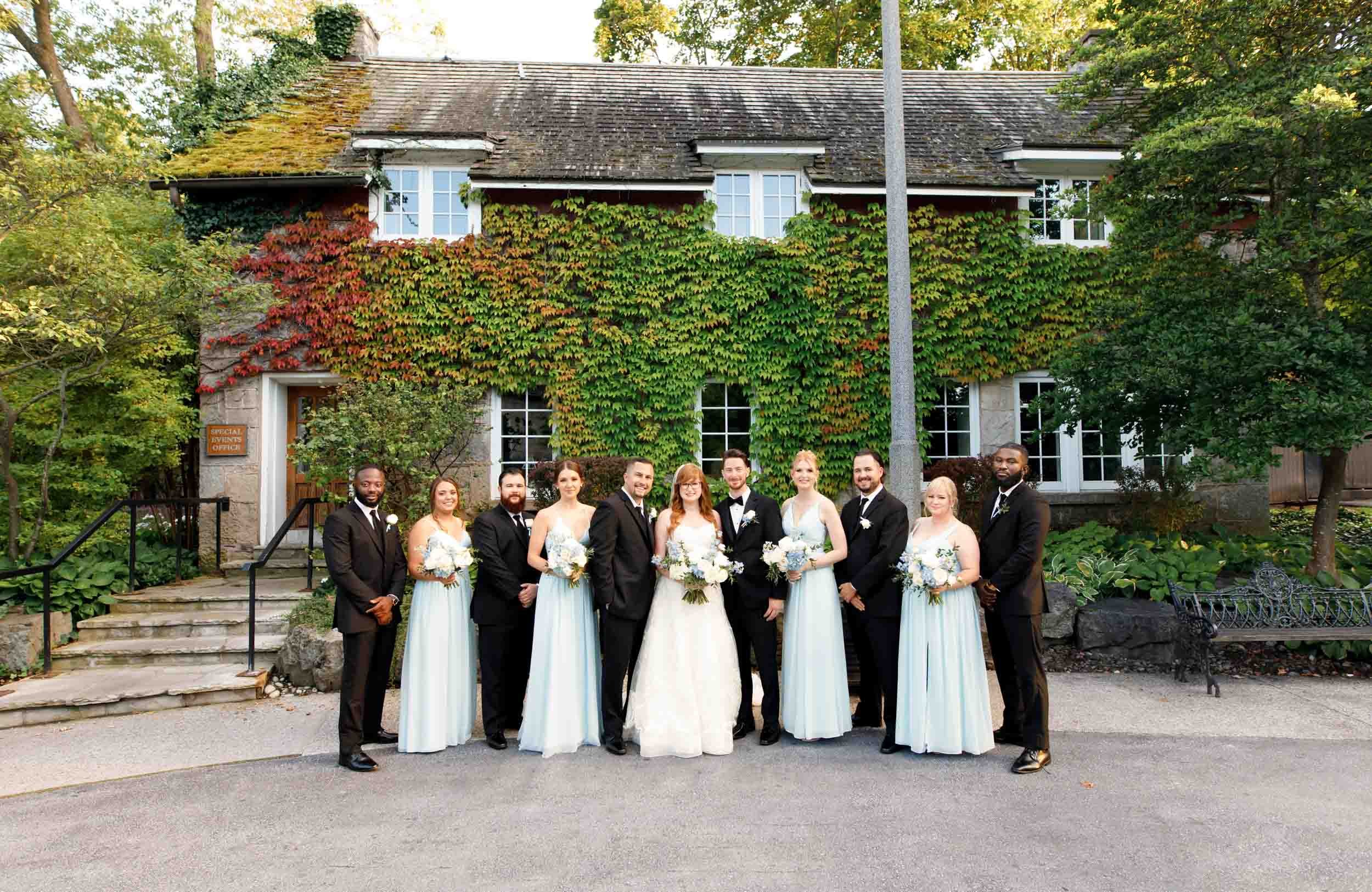 Wedding party portrait outside the Ancaster Mill in Ancaster, Ontario