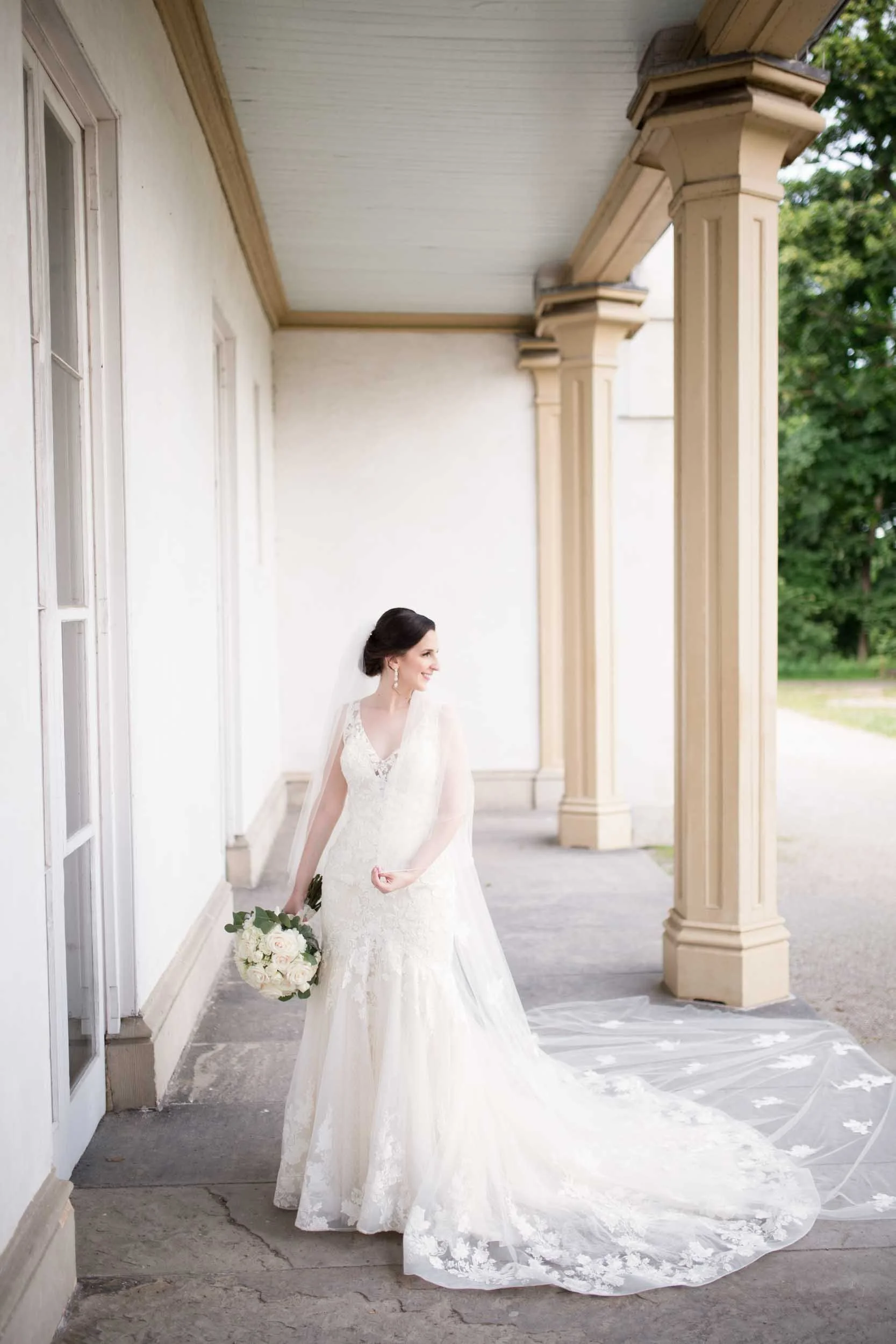 Bridal portrait along Dundurn Castle colonnade