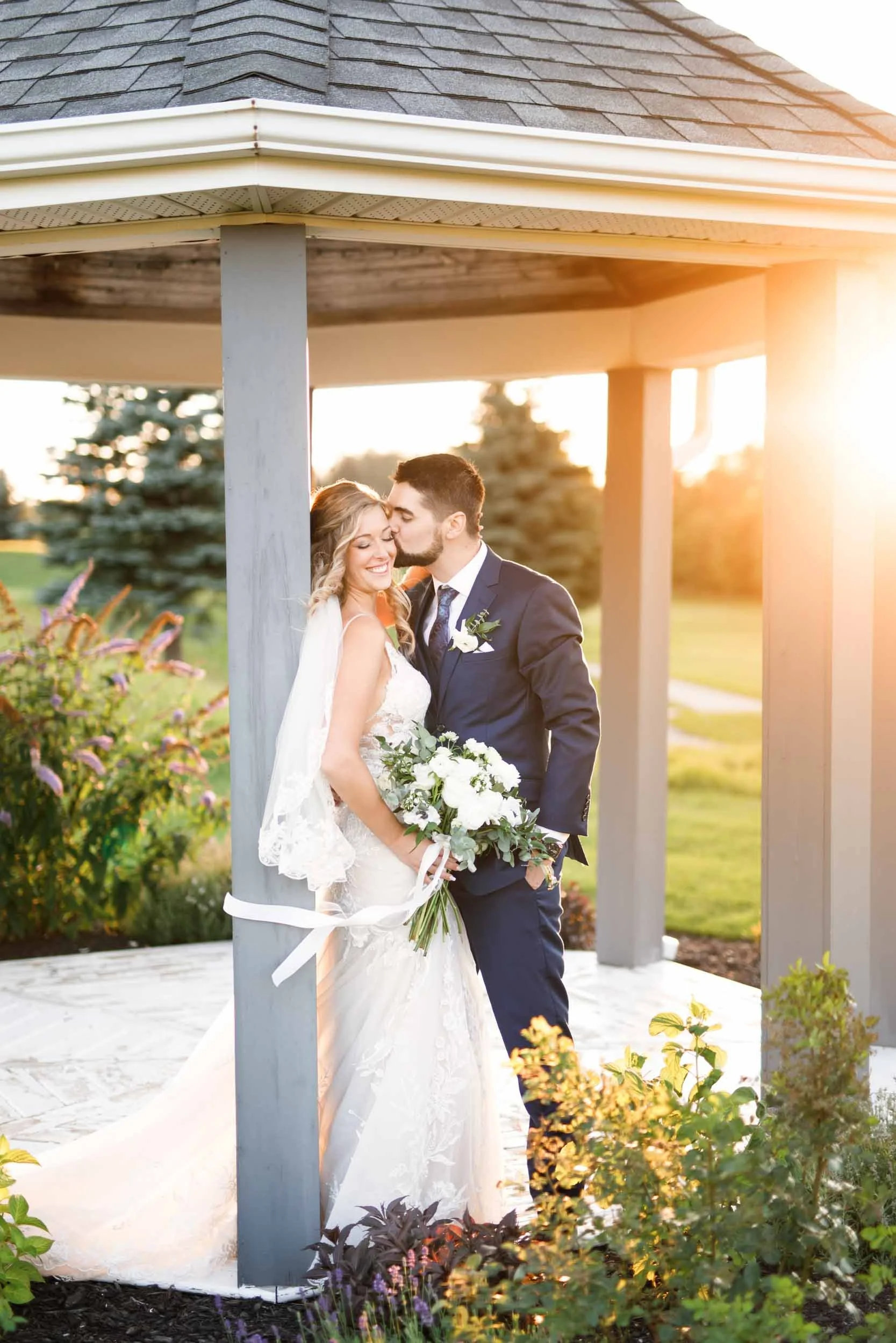 Romantic sunset portrait beneath gazebo at Whistle Bear Golf Club in Cambridge, Ontario