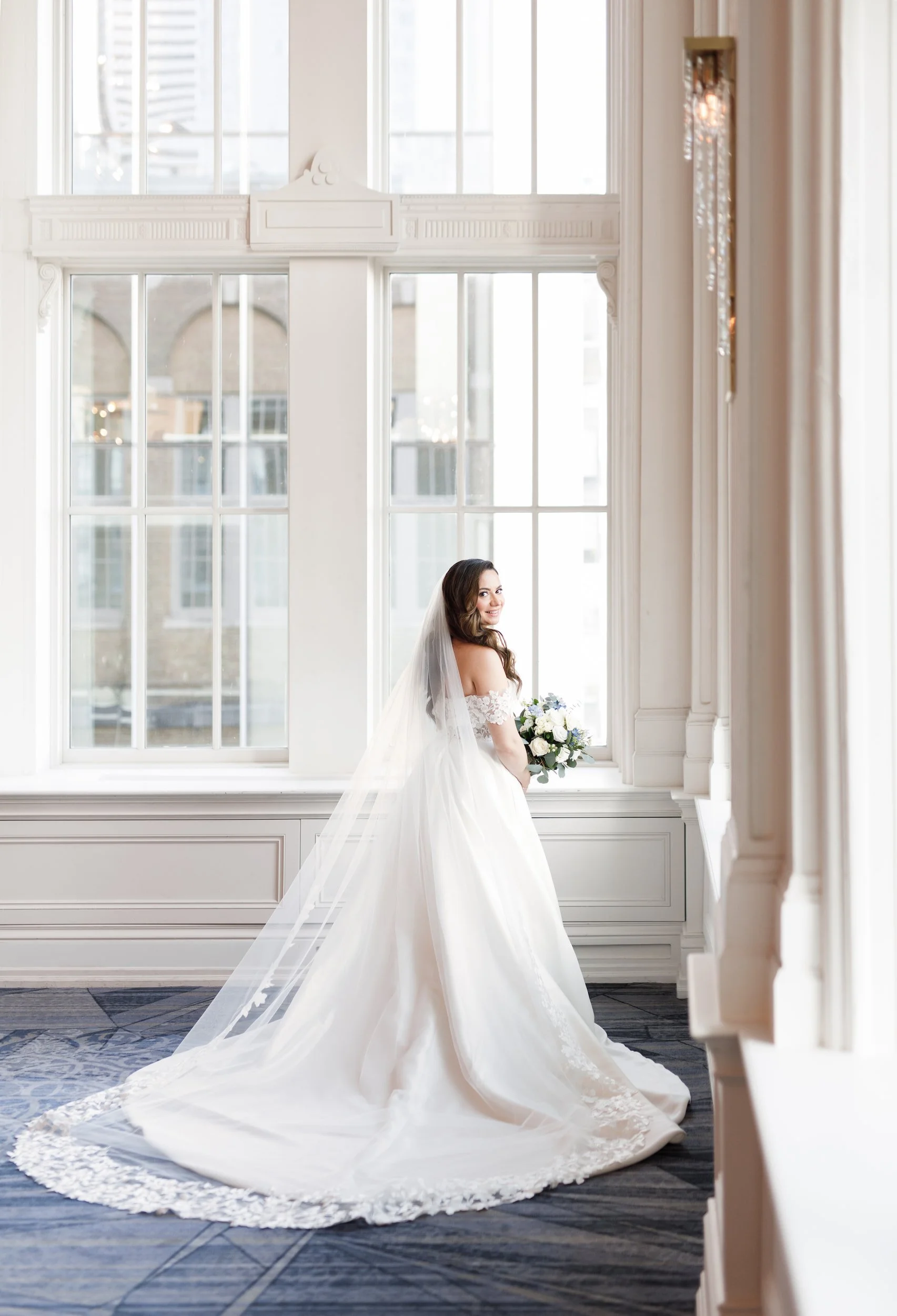 Crystal Ballroom bridal portrait in luxury hotel suite at Omni King Edward Hotel