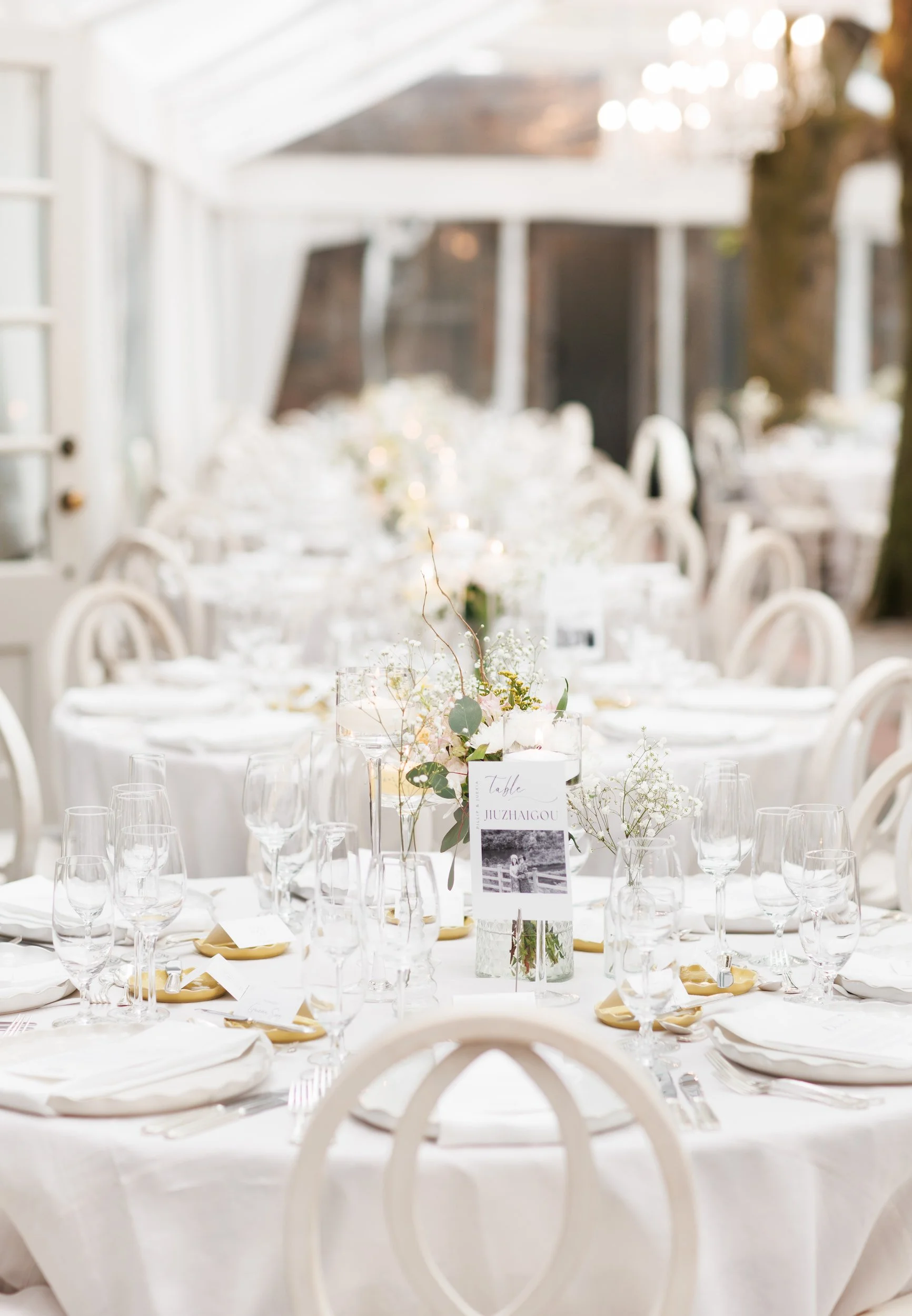 Long reception table styling under tent at Graydon Hall Manor