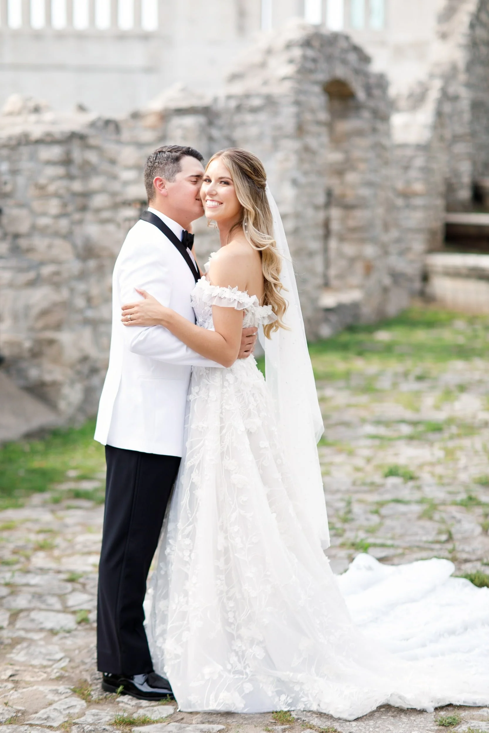 Romantic couple Mill Race Park portrait at Cambridge Mill wedding venue in Cambridge, Ontario