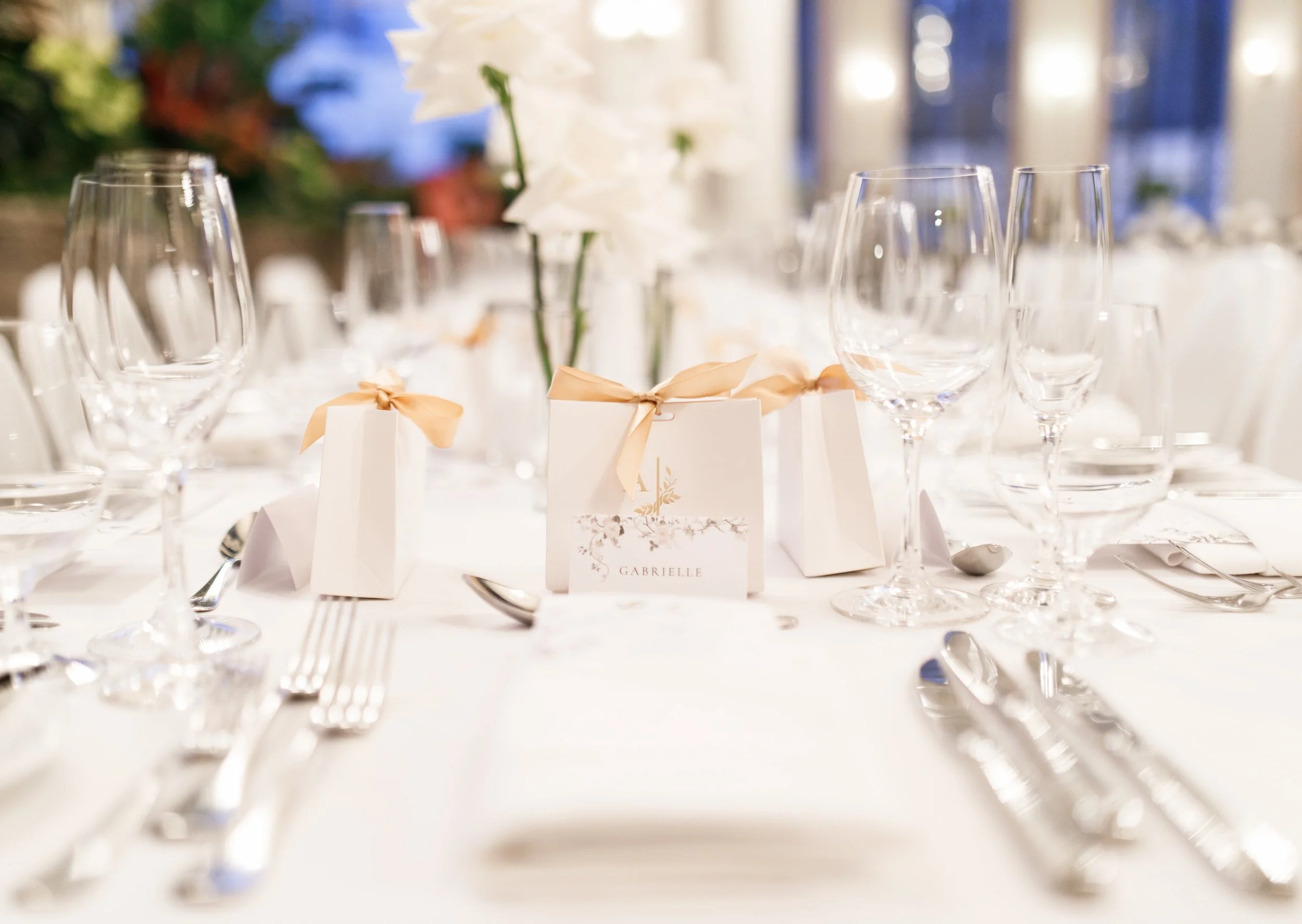 Elegant wedding reception table detail inside Casa Loma Conservatory