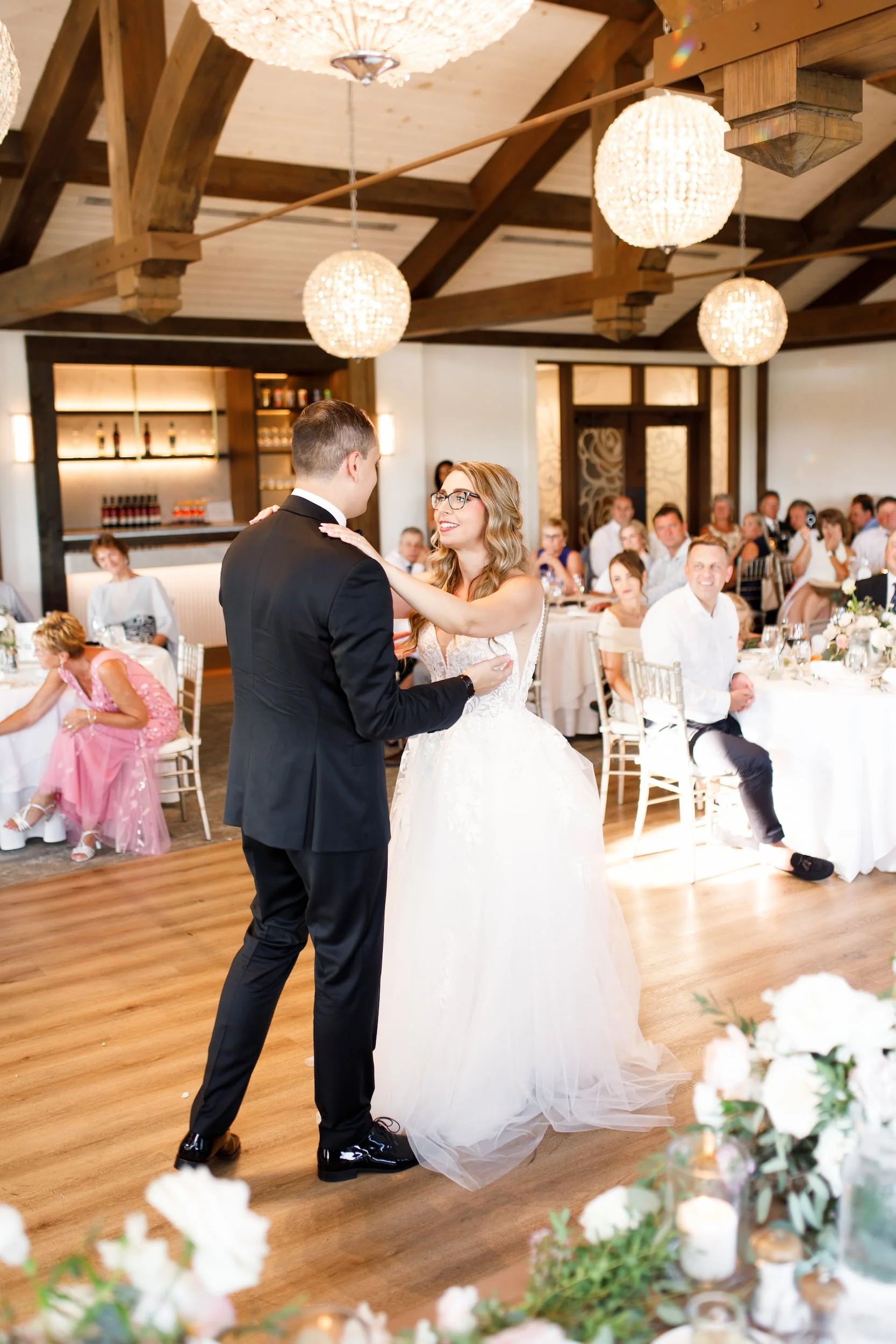 Bride and groom dancing during reception at Whistle Bear Golf Club in Cambridge, Ontario
