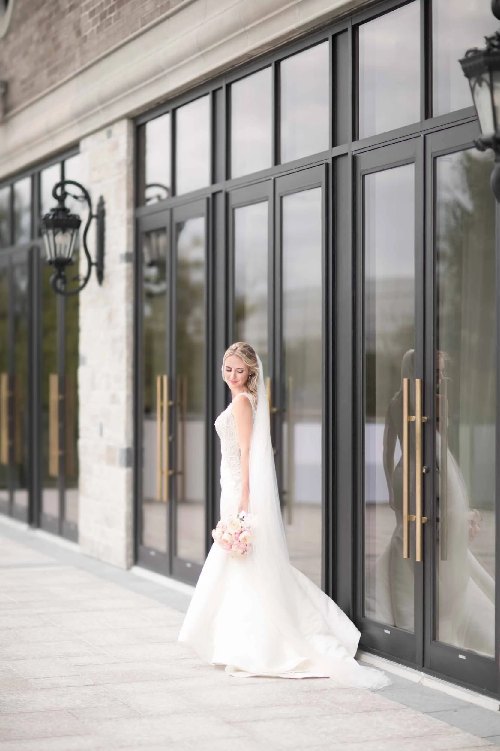Bride portrait at the Arlington Estate glass entrance in Vaughan