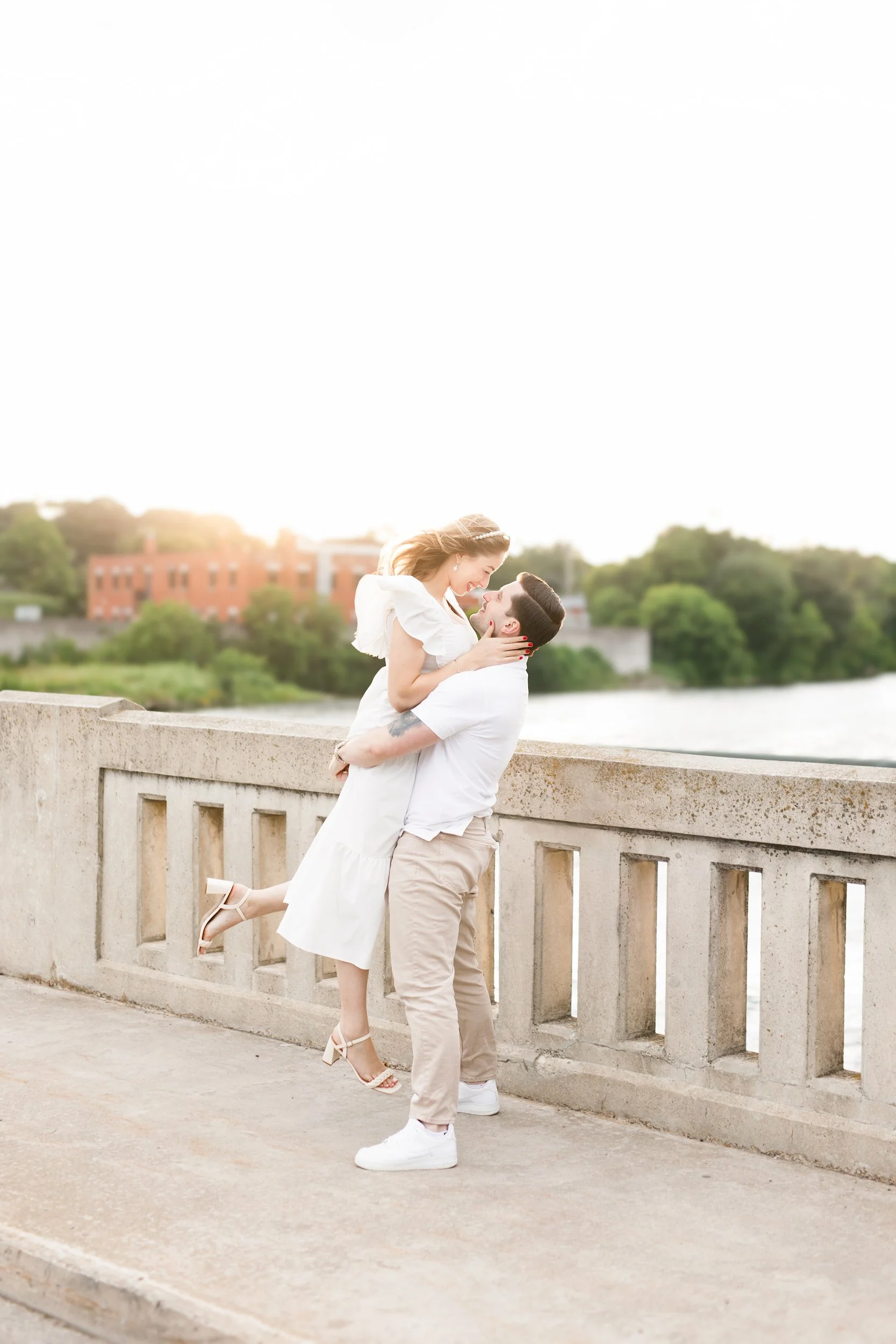 Romantic lift on Grand River walkway near Cambridge Mill in Cambridge, Ontario