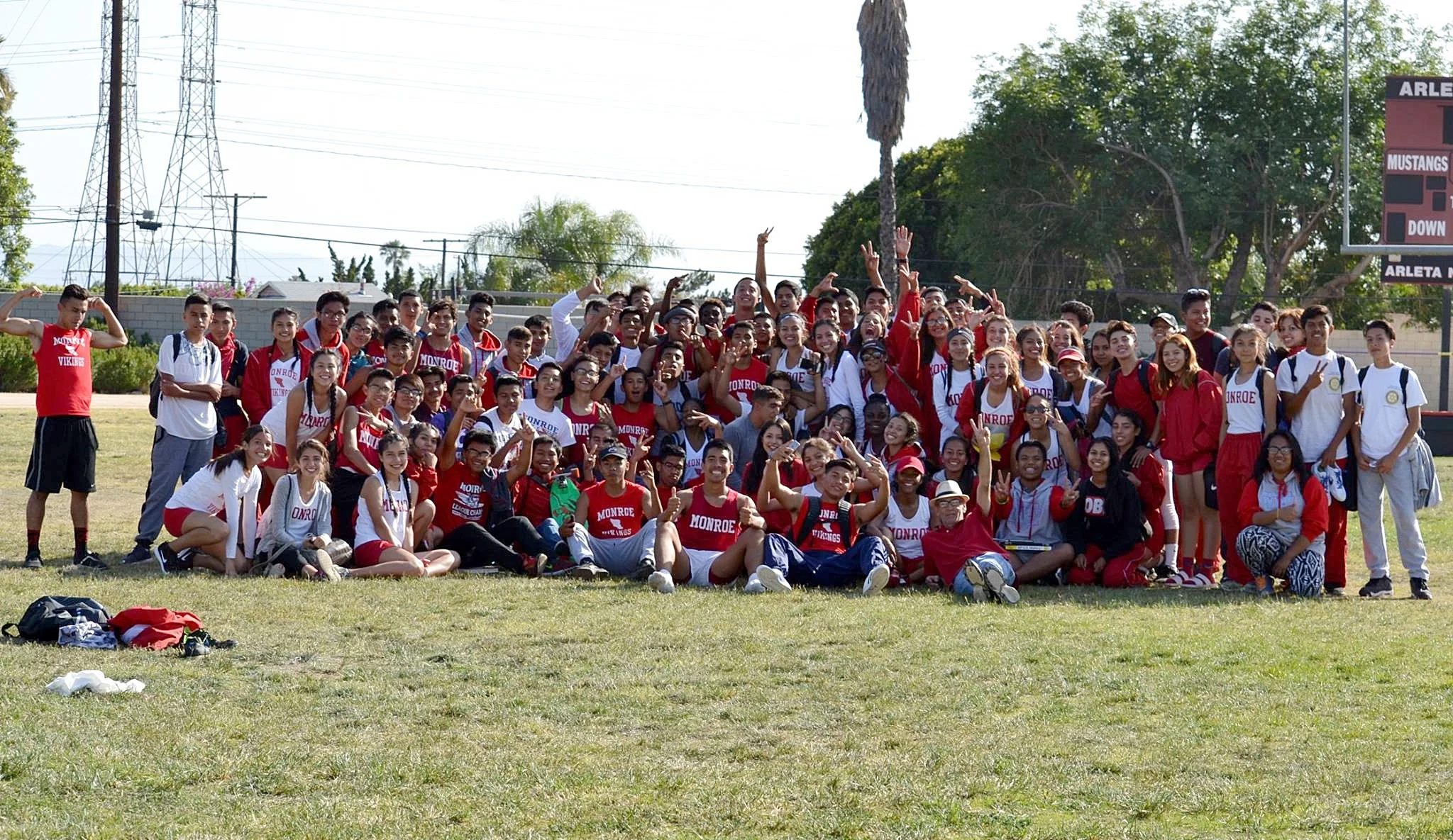 Coach Hernandez, Coach Harris, and his Spring 2016 track-and-field team.