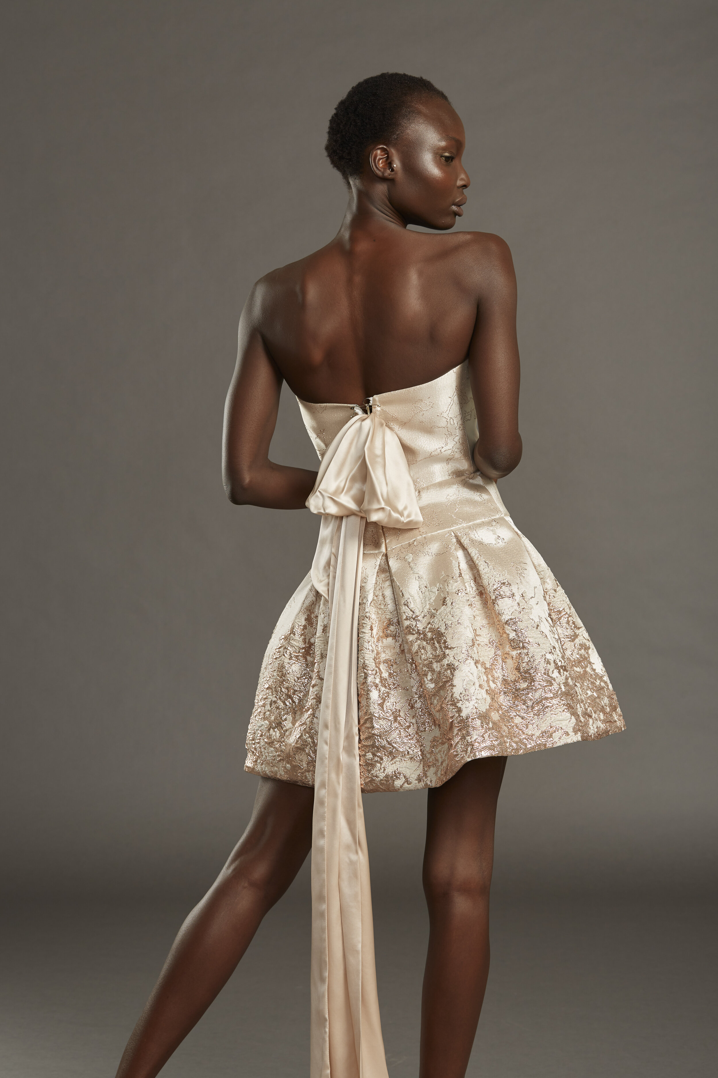 volcanic border bubble dress w/ hand linked jewelry chain detail & silk charmeuse back bow