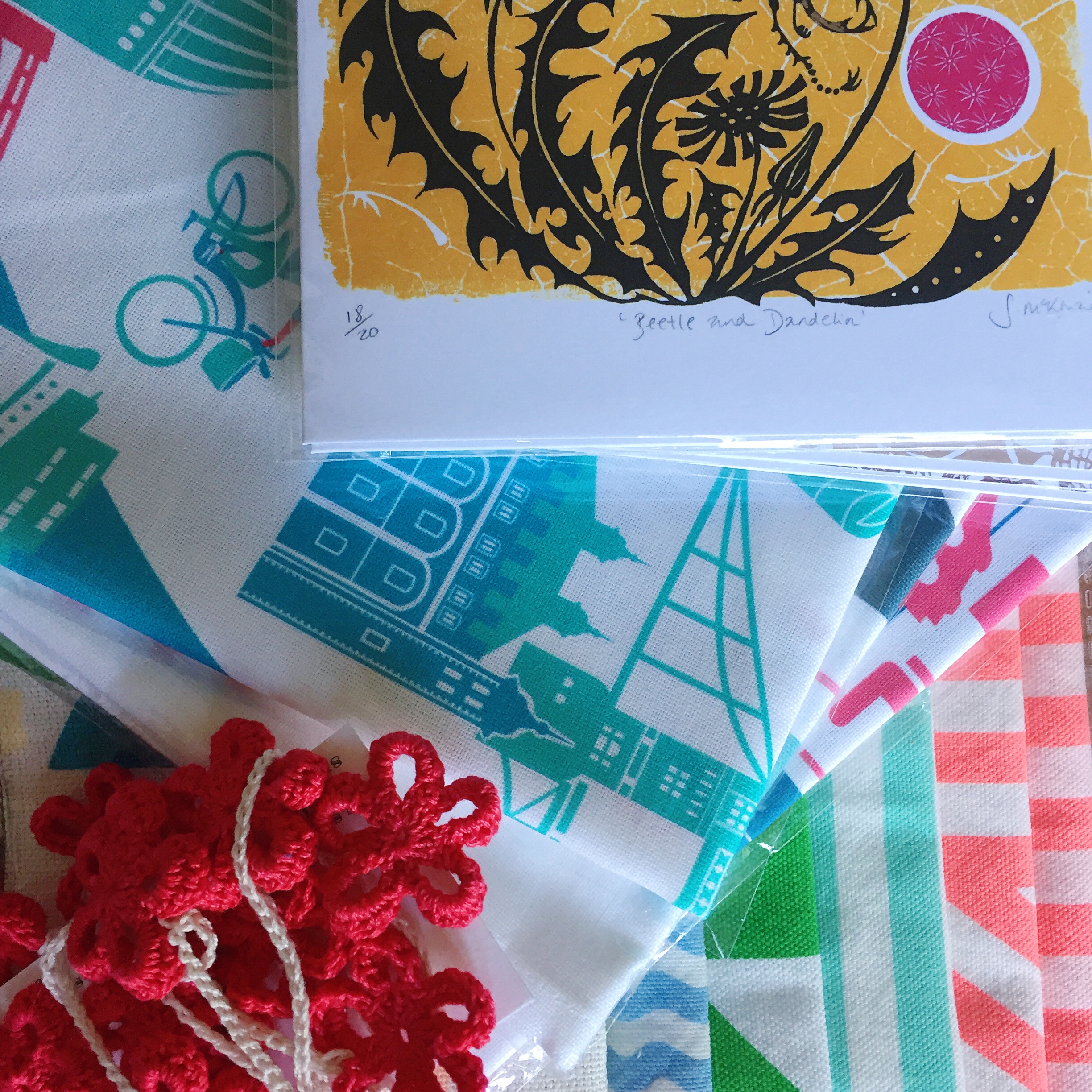 Cards from Julia McKenzie , tea towells from Ray Stanbrook , fabric scraps from Kangan Arora (at Bainbridge Studios) and crochet garland from Paola Moglia (also at Bainbridge Studios).