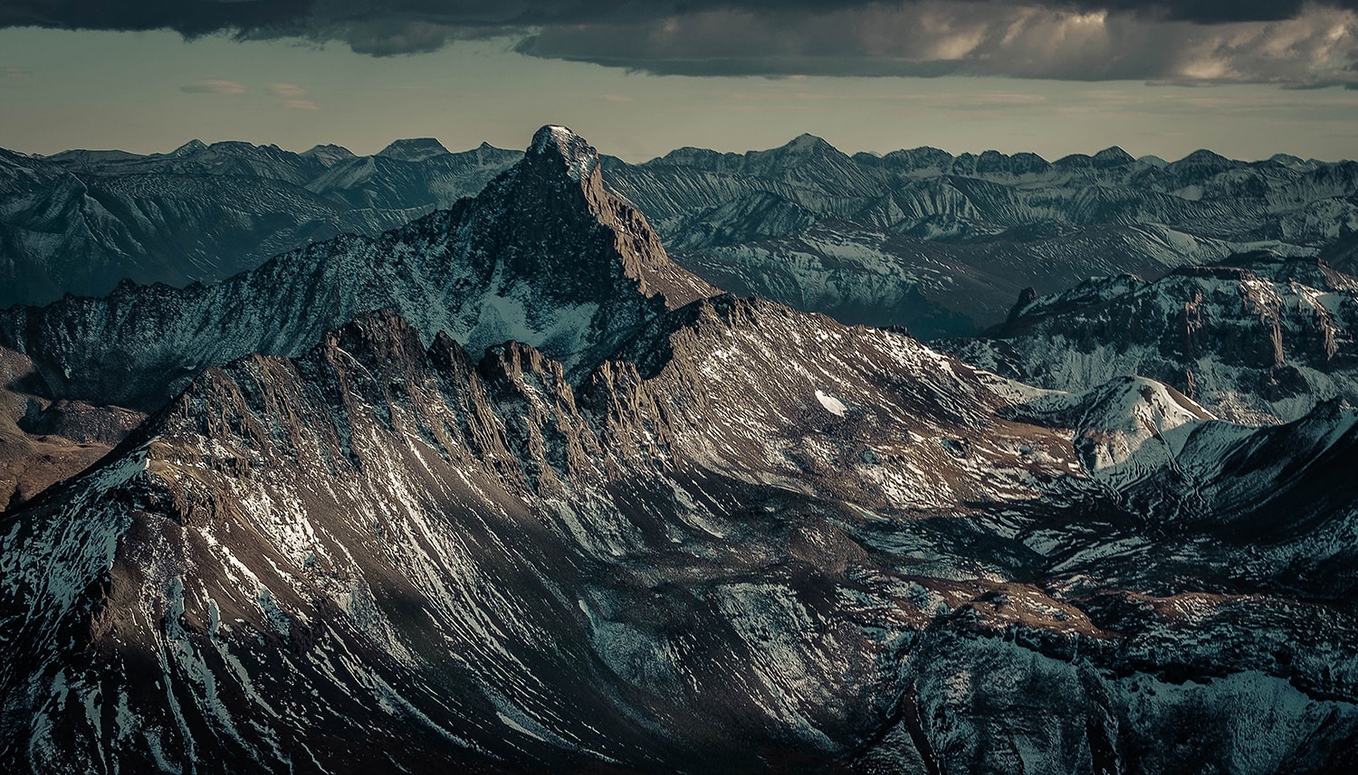 We had broken formation, were heading home and I saw this. It might just be the start of a new project of mountain landscapes from an aircraft. A job for the GFX maybe? - Fujifilm X-Pro2 & XF50-140 F2.8 - f20, 200ISO, 60th