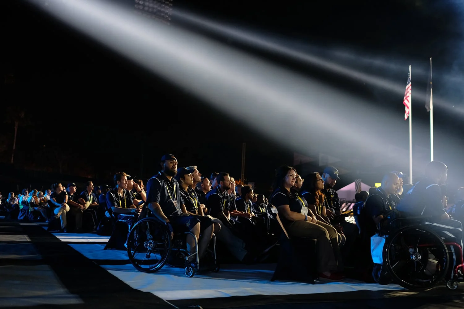 Invictus athletes listening to stage program during the Opening Ceremonies of the 2016 Invictus Games at the ESPN Wide World of Sports Complex in Orlando, Florida, May 8, 2016. The Invictus Games is an international adaptive sporting event for wounded, injured, and ill service members and veterans. (Official White House Photo by Chuck Kennedy)