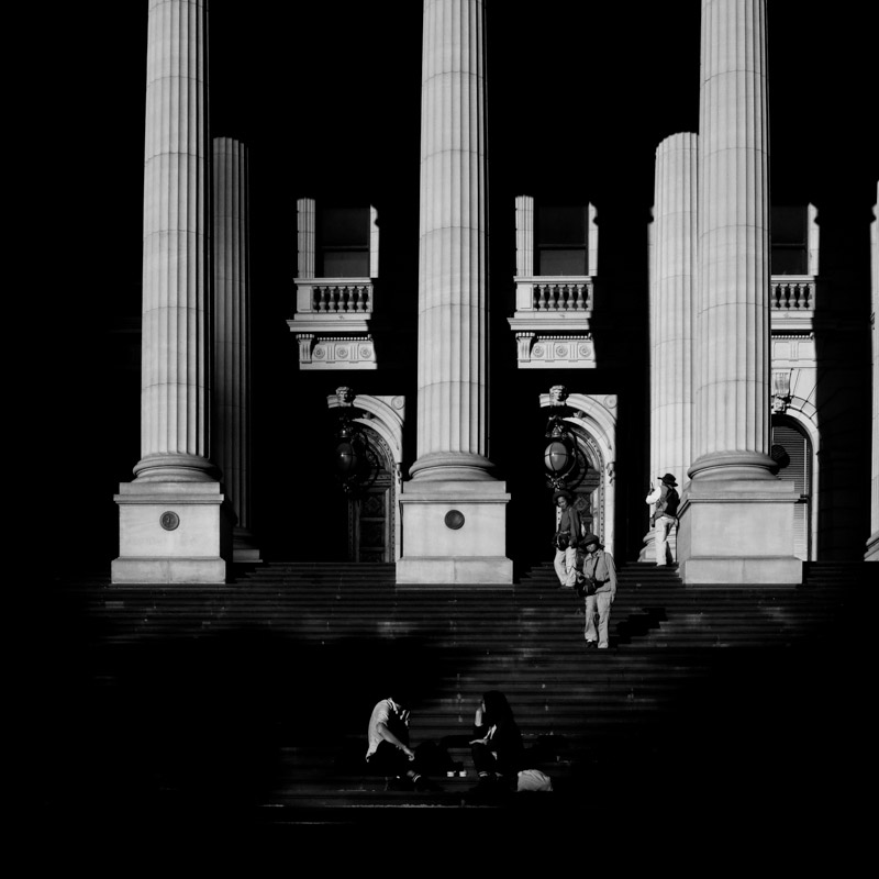 Afternoon light hits the steps of the Victorian Parliament House.