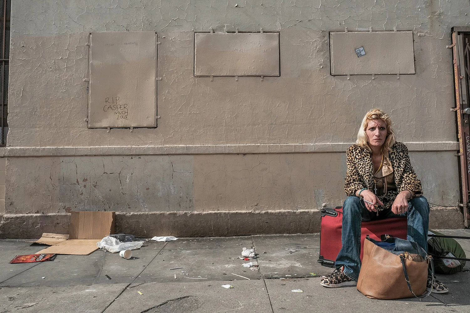 Floating — C. sits at 4th and Towne Ave after using heroin, lost in thought.