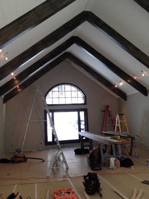 Painted ceiling and stained beams