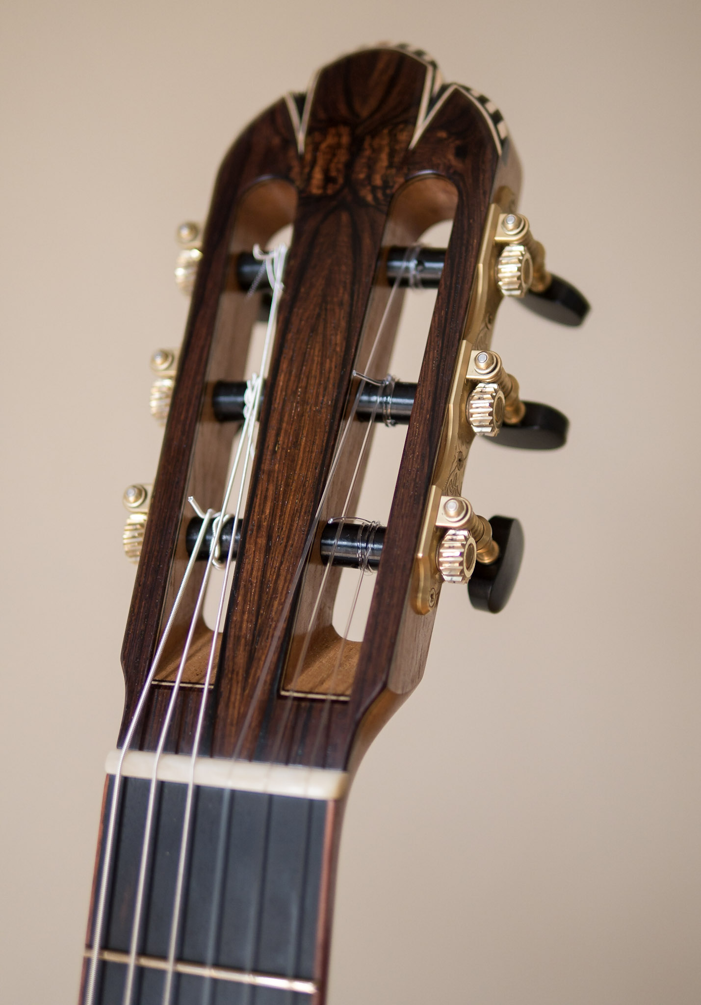 Bookmatched Brazilian Head Veneer.  Maple/Ebony inlays with Bloodwood keystone