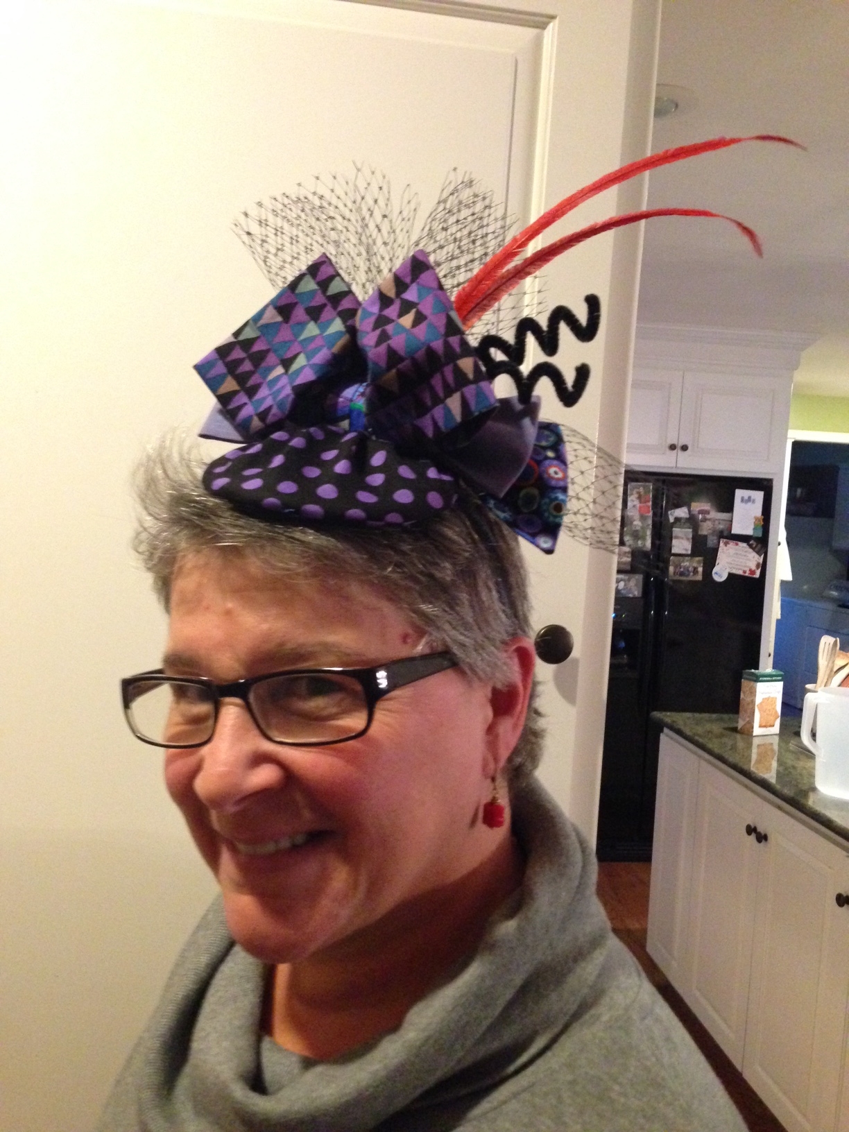 I used Tents, Spots and Paperweight and a little piece of shot cotton in this Fassett-nator.
