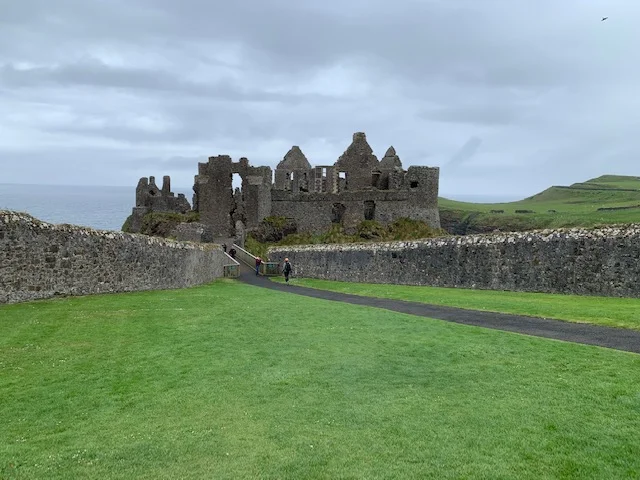 Dunluce Castle ruins. Perched right on the edge of the cliff, this castle is amazingly well preserved. I really enjoyed hiking up the coast along the cliffs and seeing this up ahead.