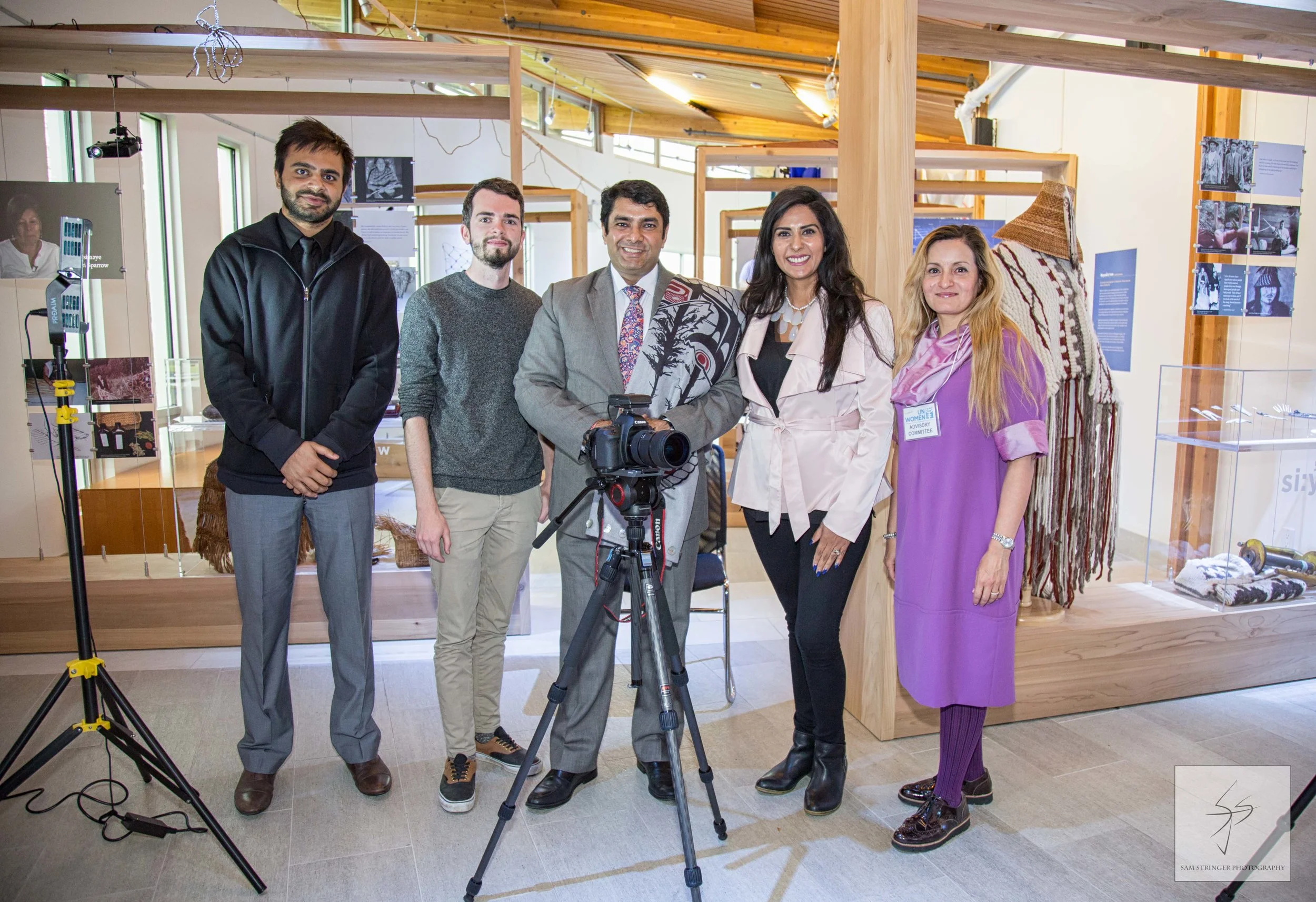 The KharéCom production team poses with Ravi Karkara.
